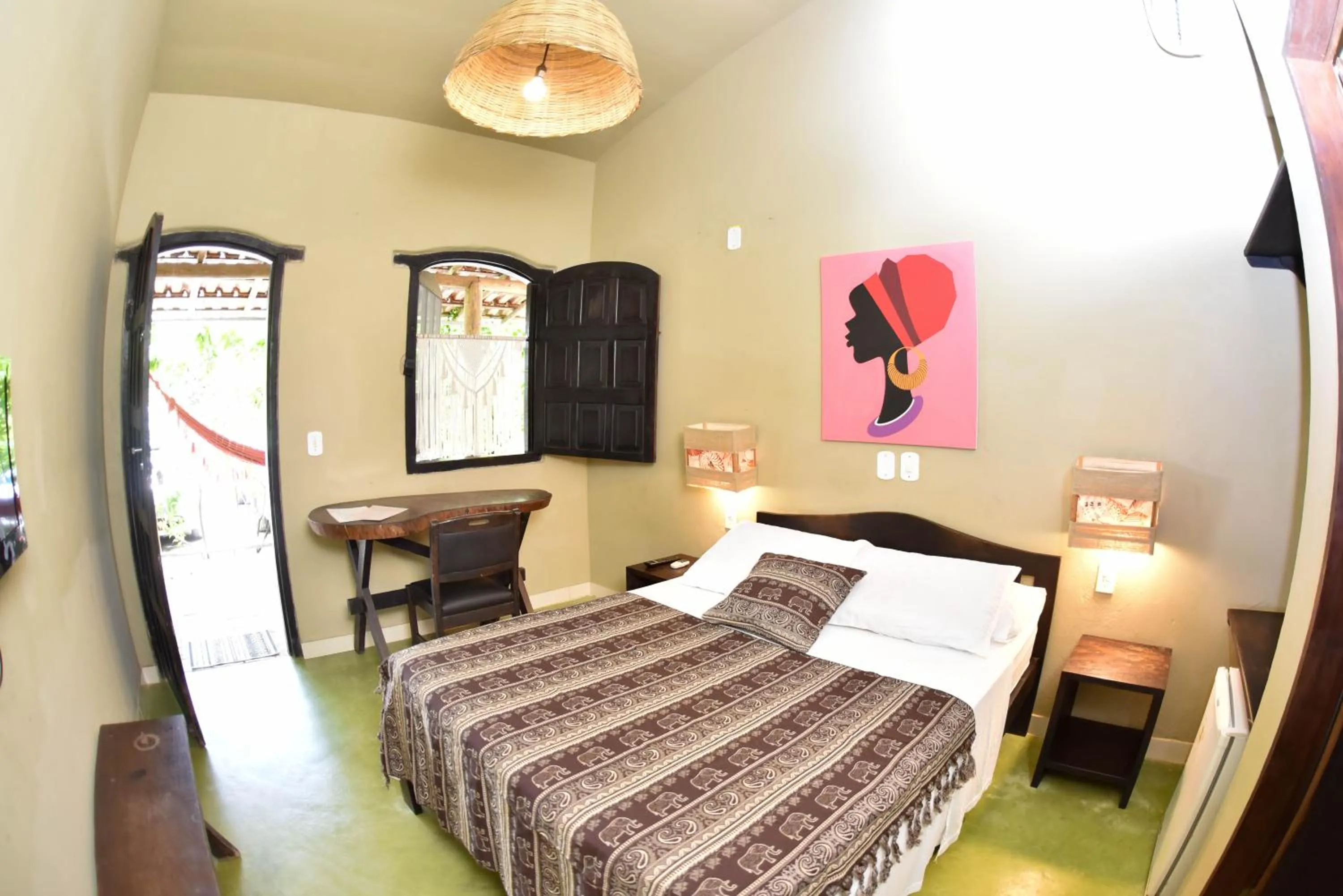 Bed in Pousada Tubarão