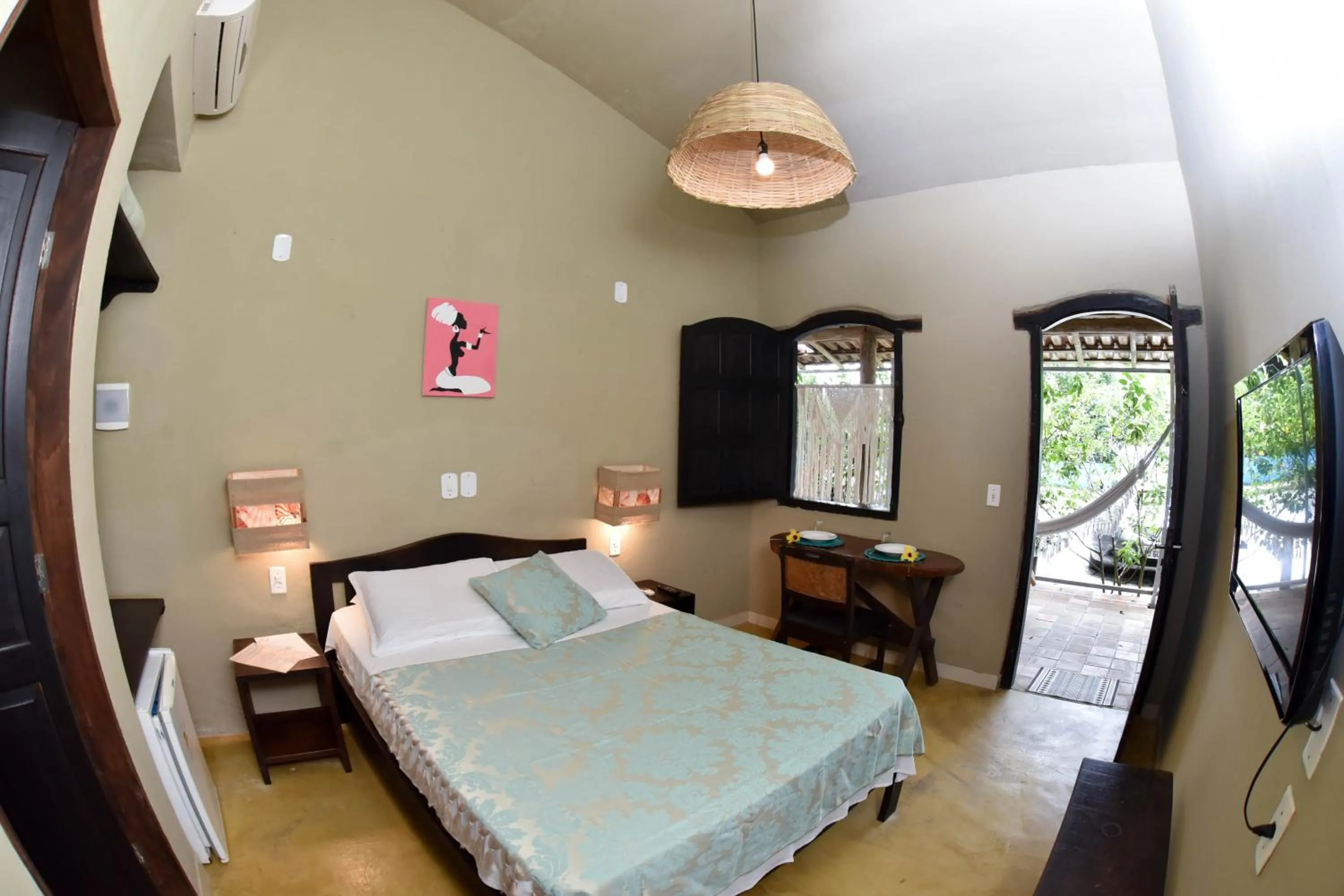 Bed in Pousada Tubarão