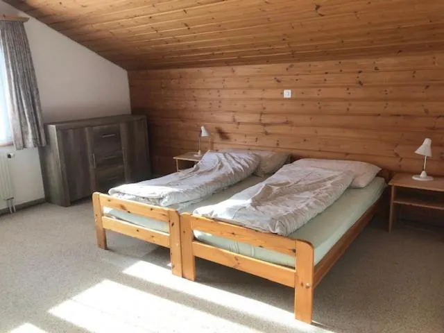 Bed in Hotel Alpina