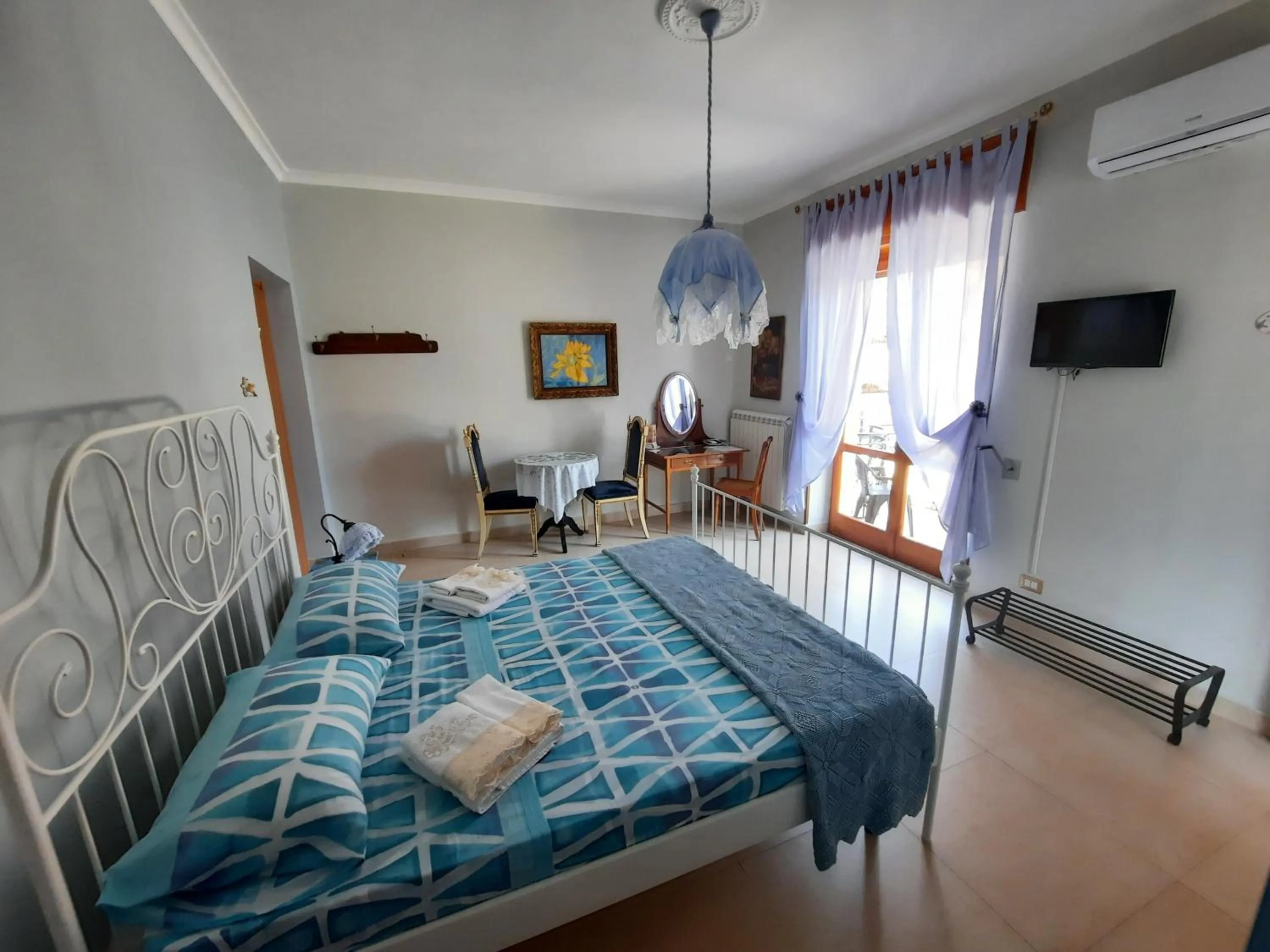 Bedroom in Villa Ada B&B