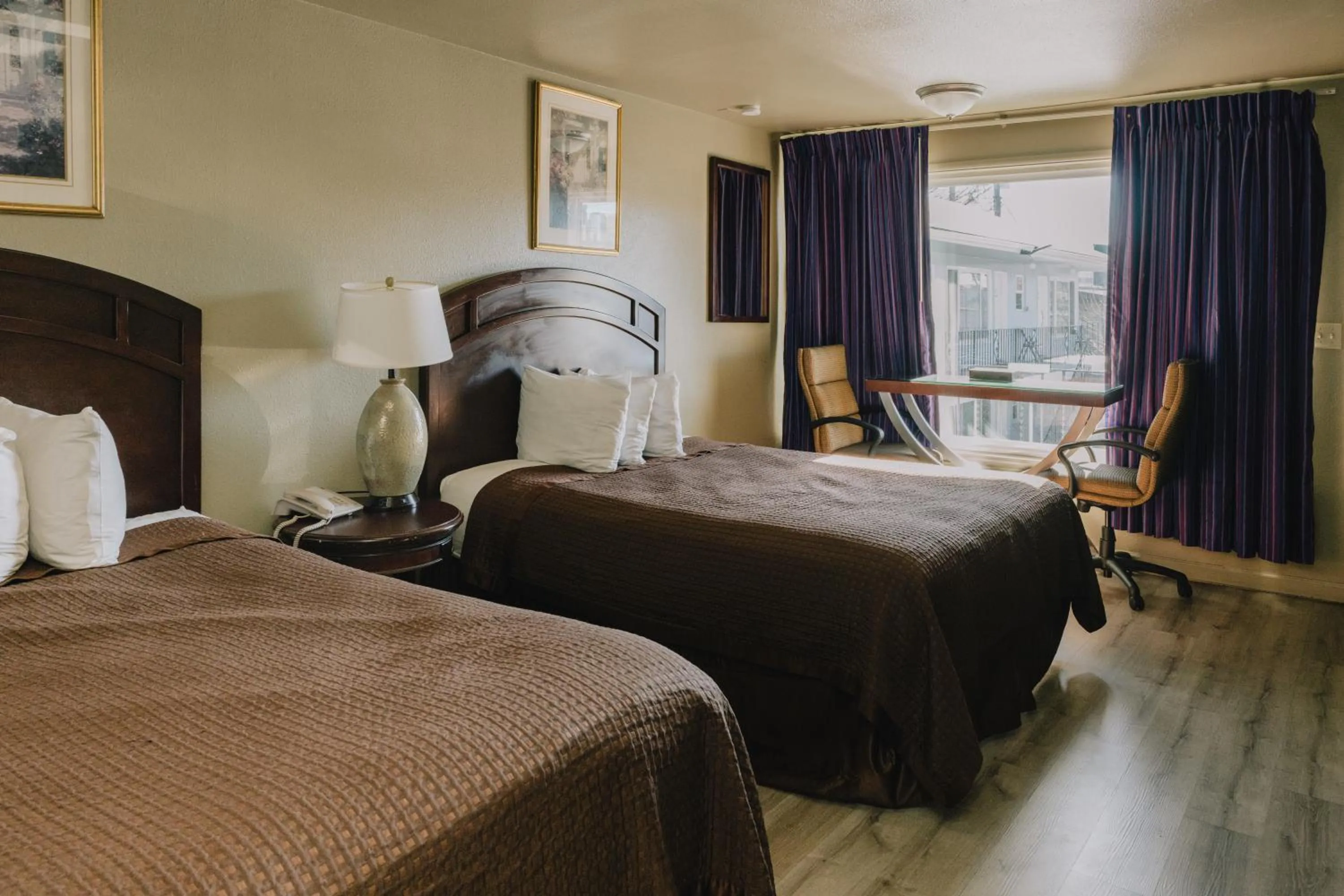 Bed in La Hacienda Motel