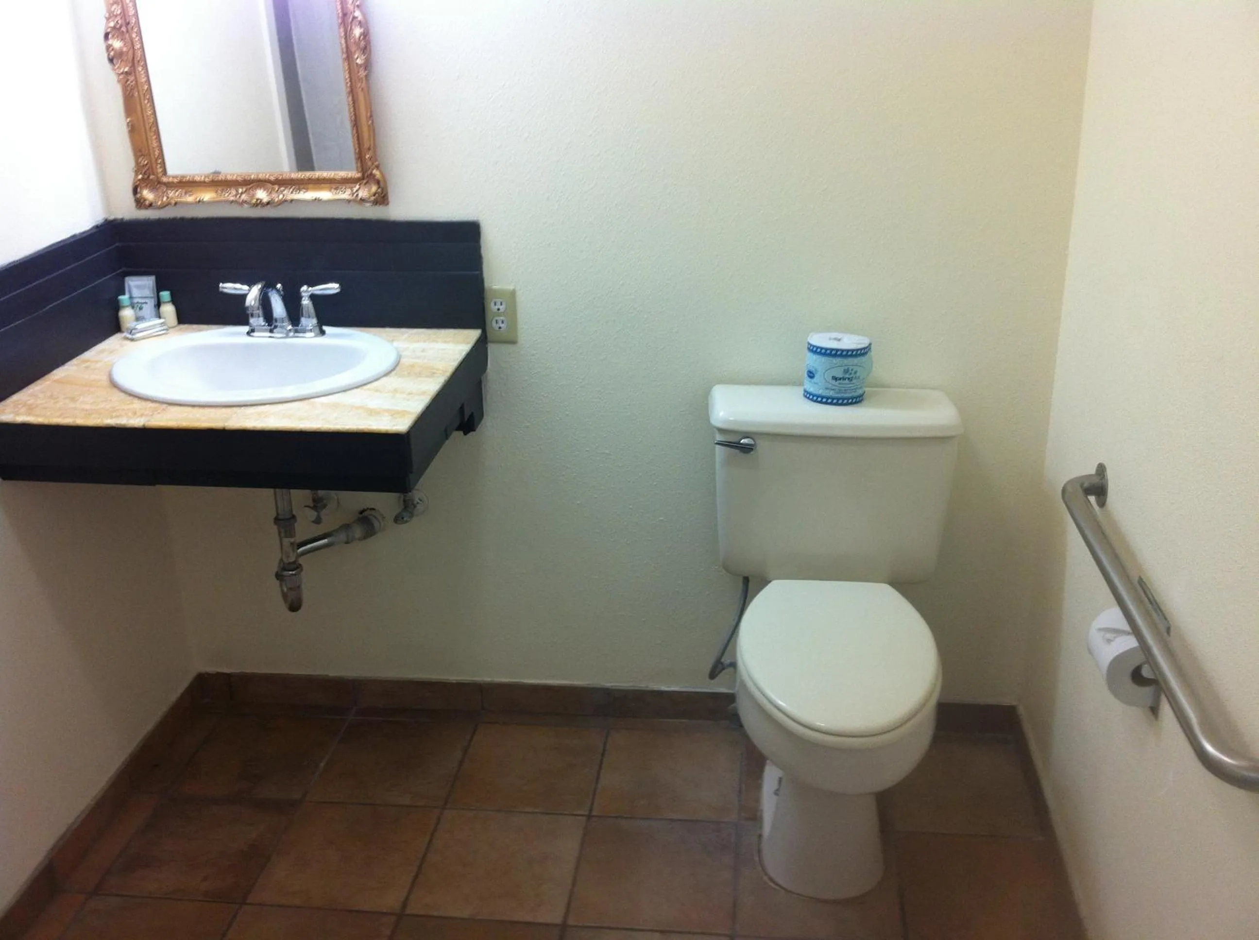 Toilet in La Hacienda Motel