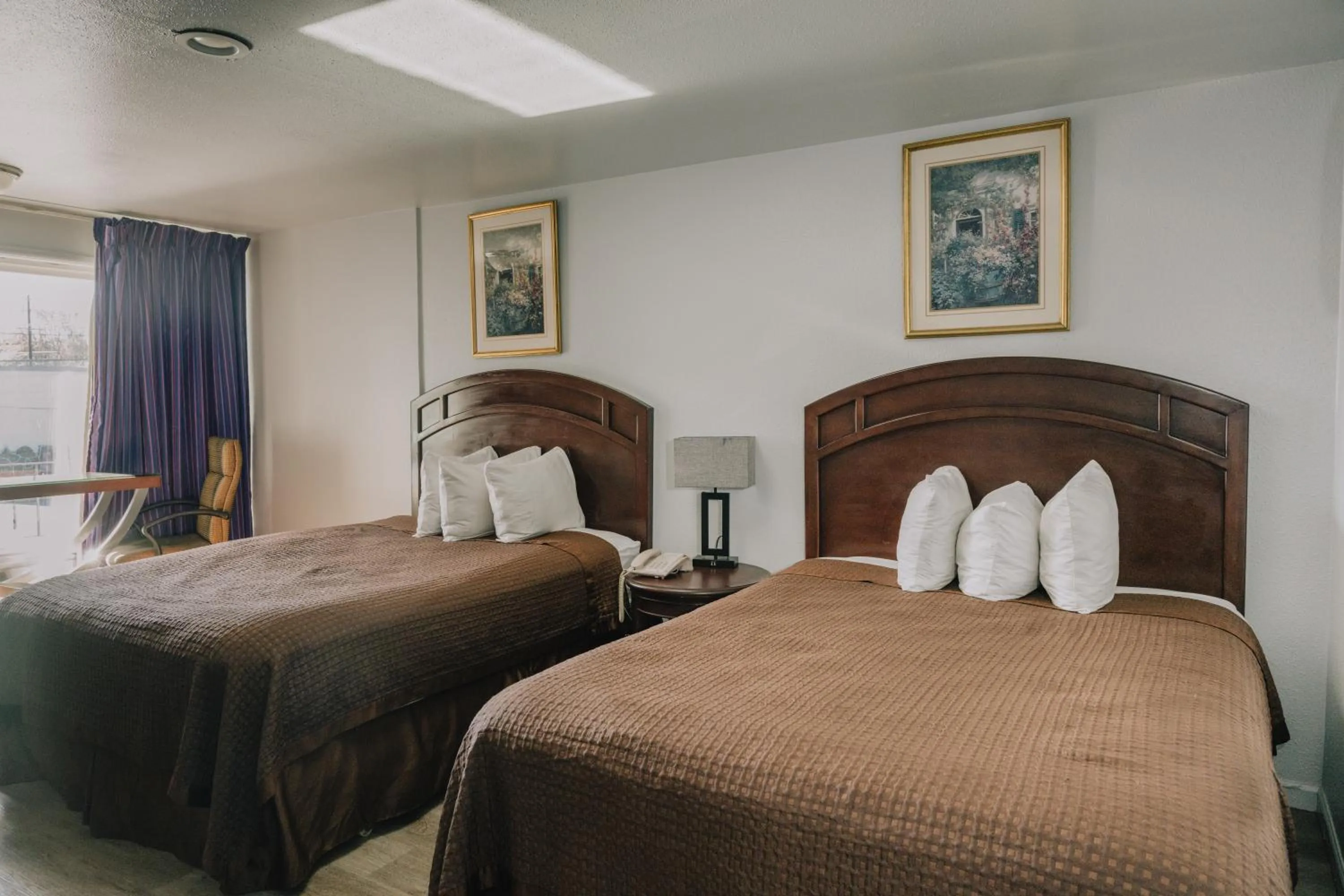 Bed in La Hacienda Motel