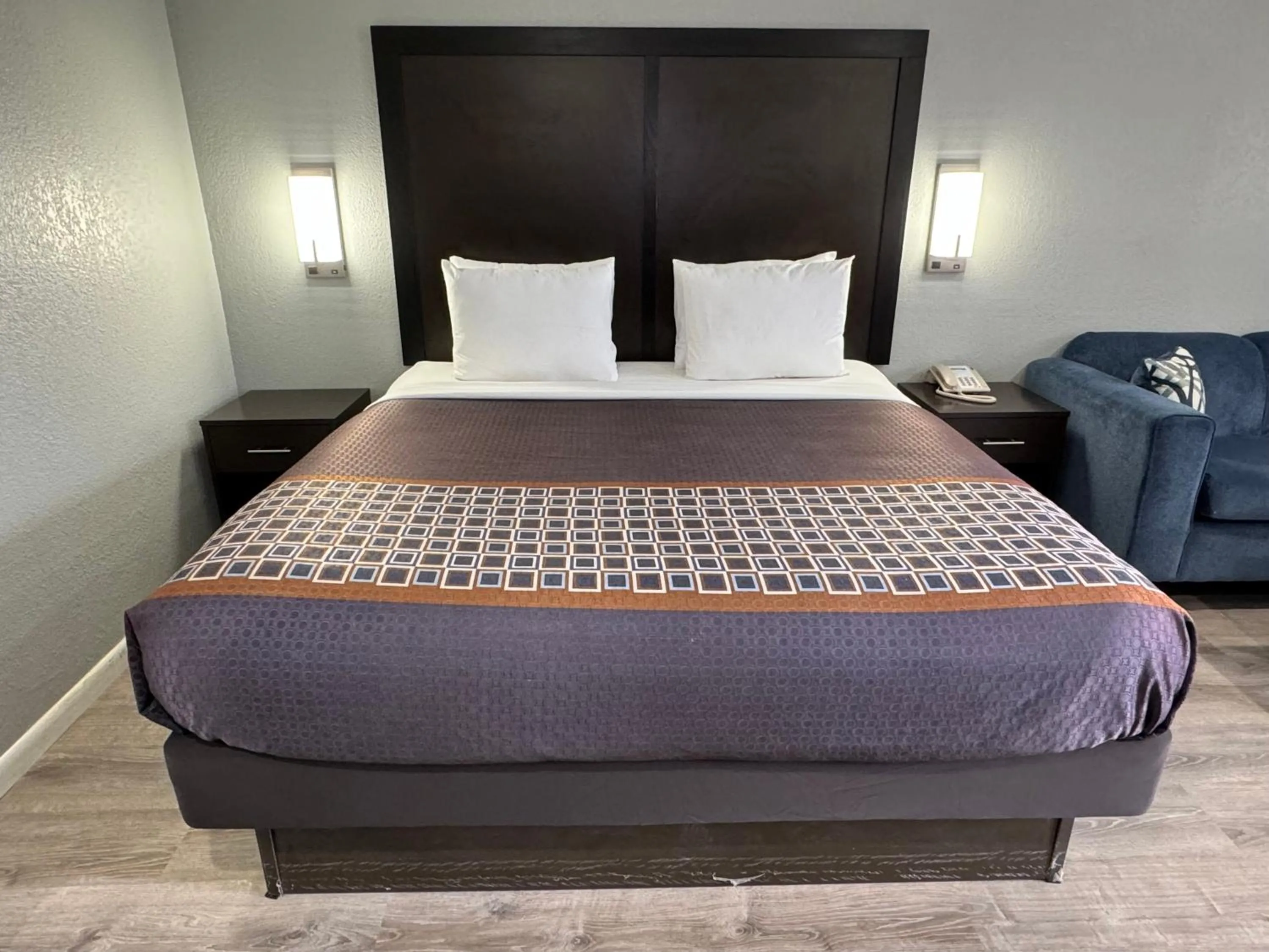 Bed in Copper Manor Motel