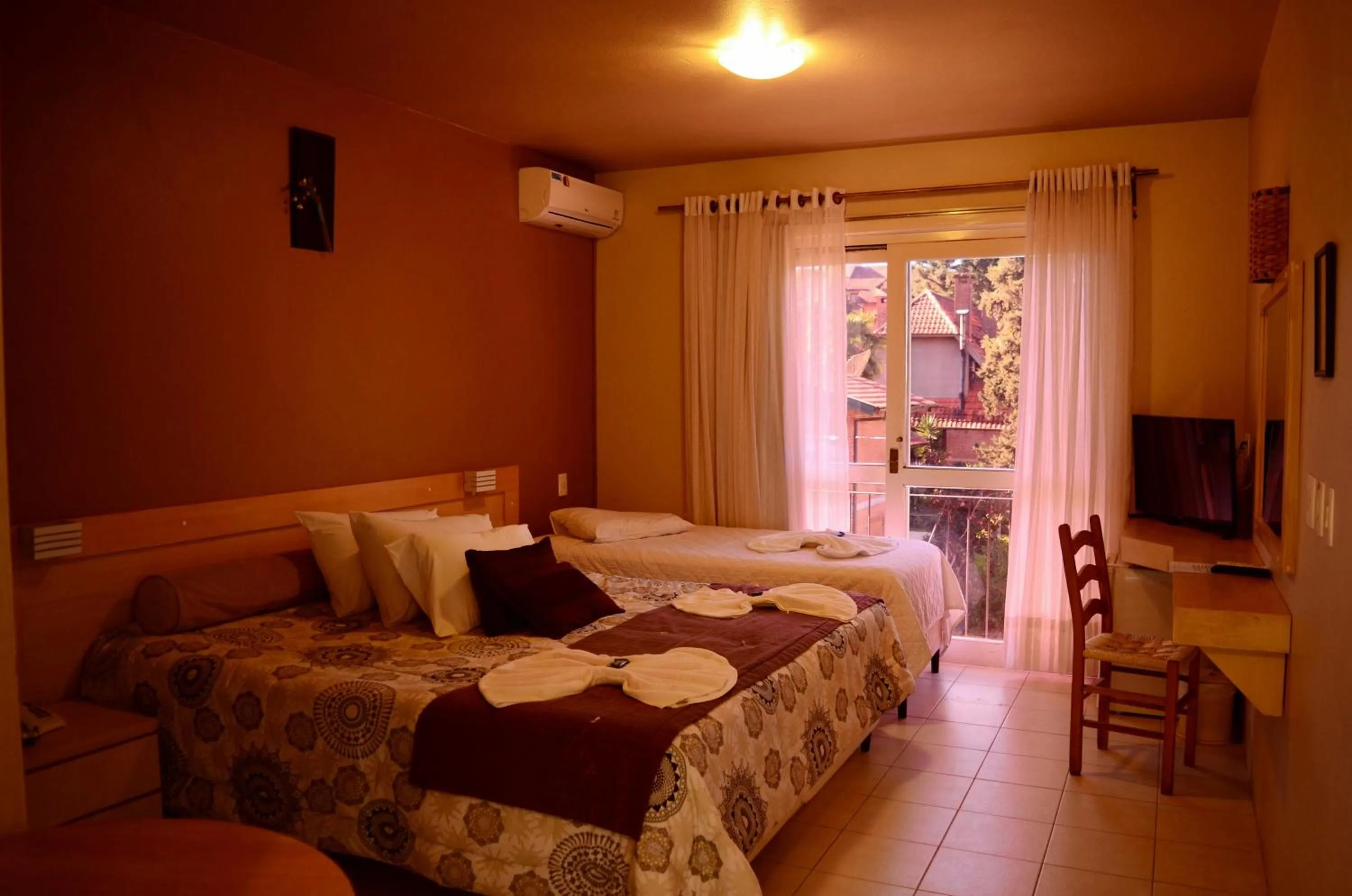 Bed in Pousada Tango