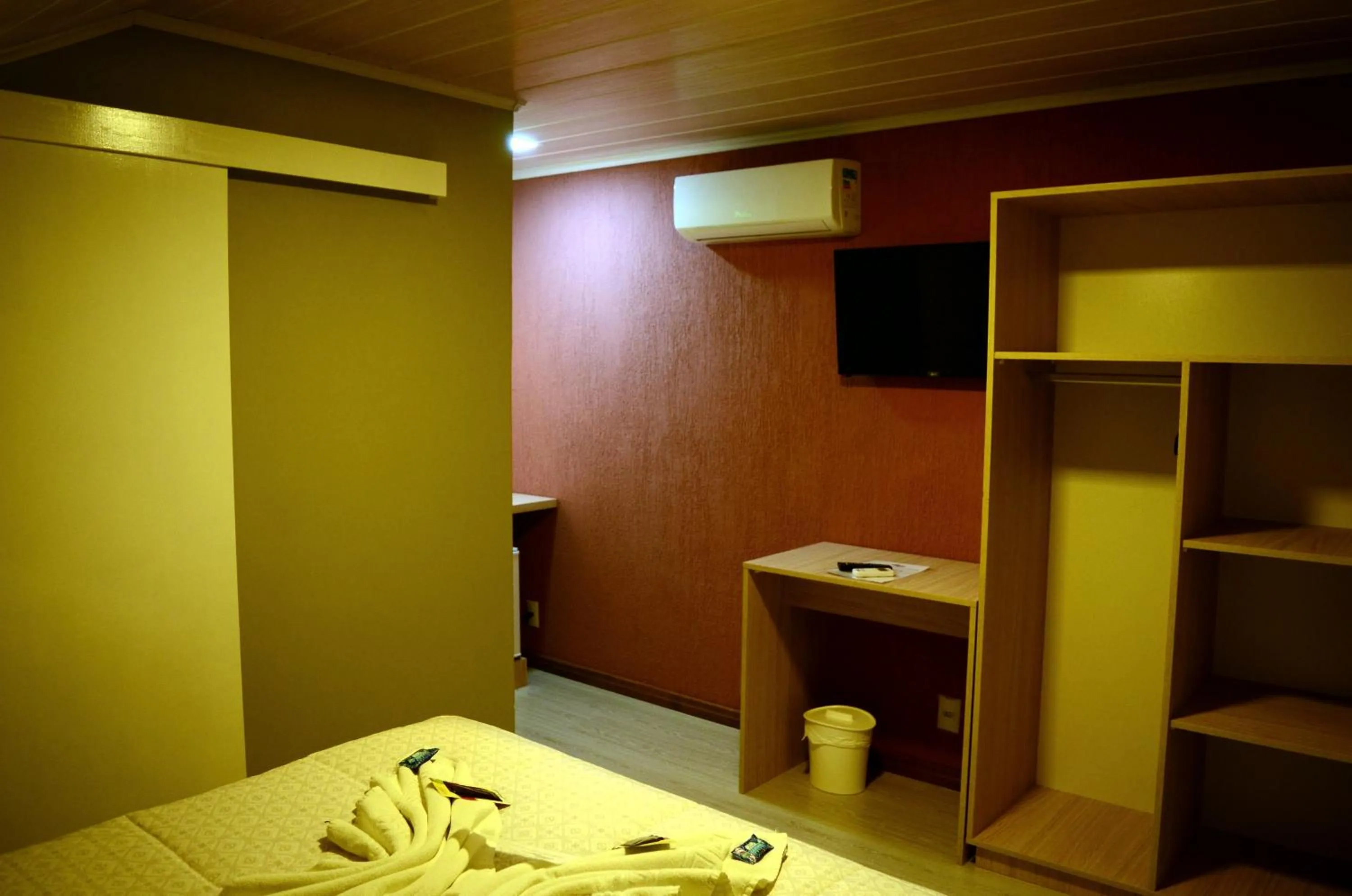 Bed in Pousada Tango