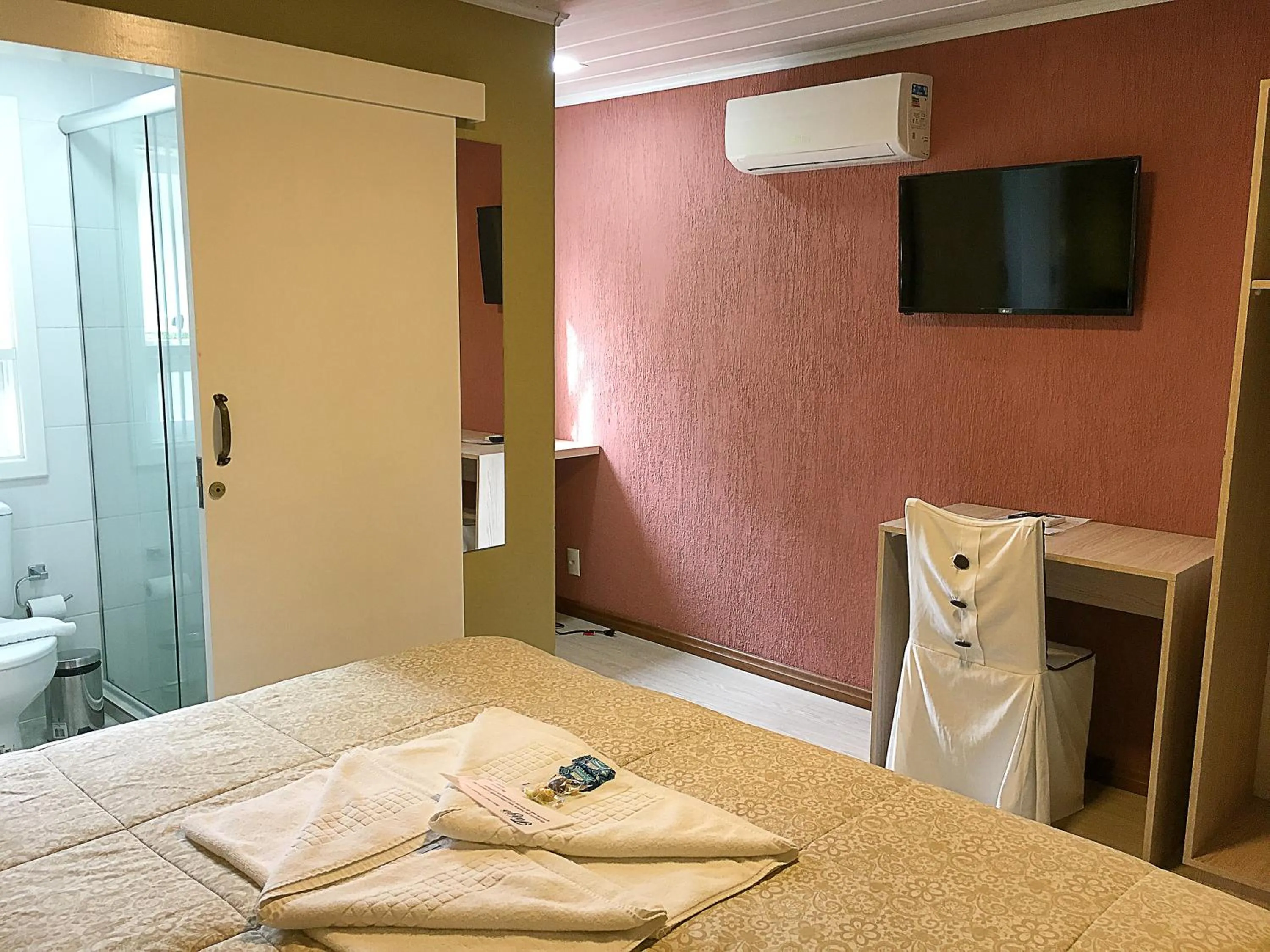 Bed in Pousada Tango