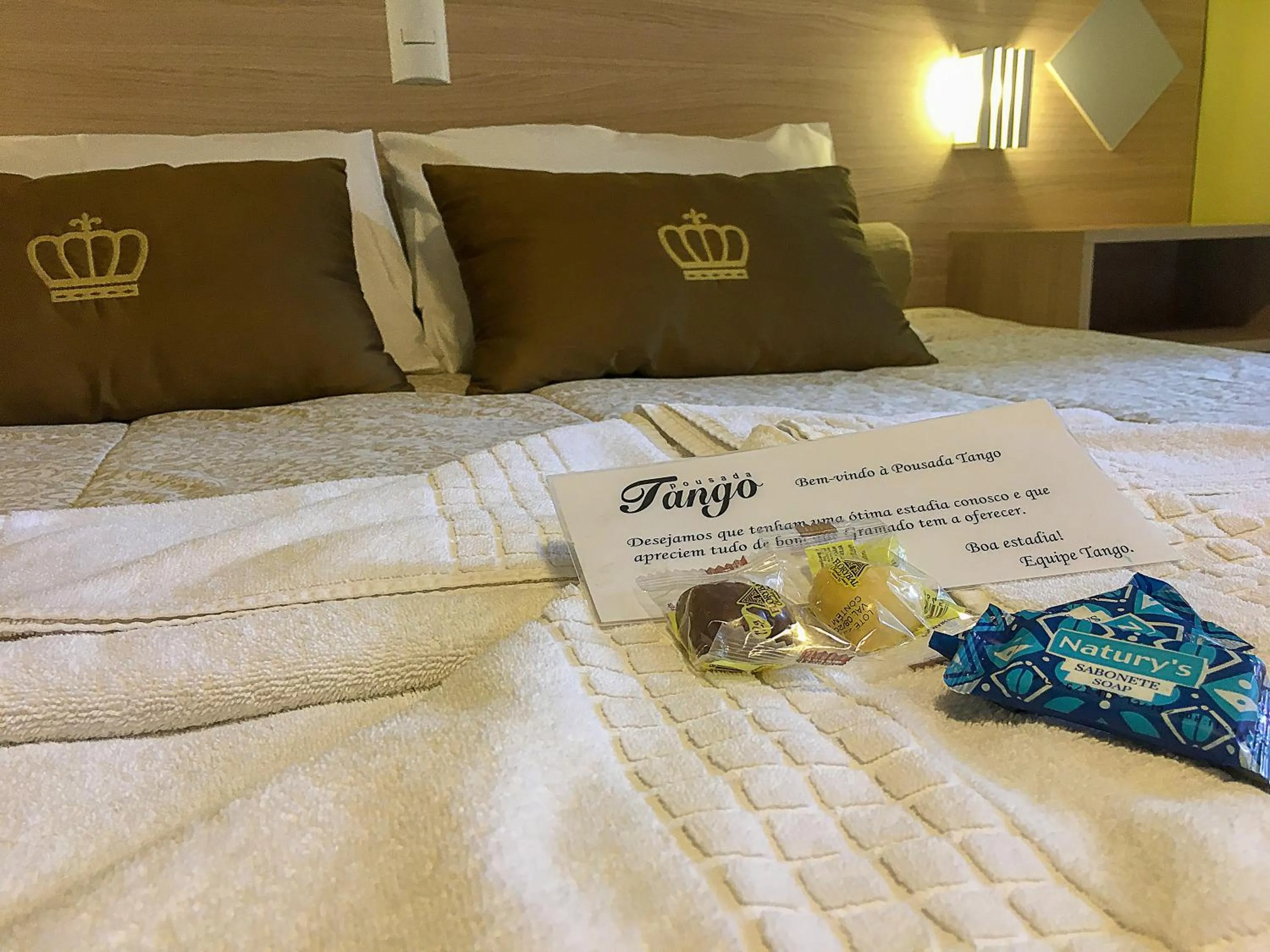 Bed in Pousada Tango