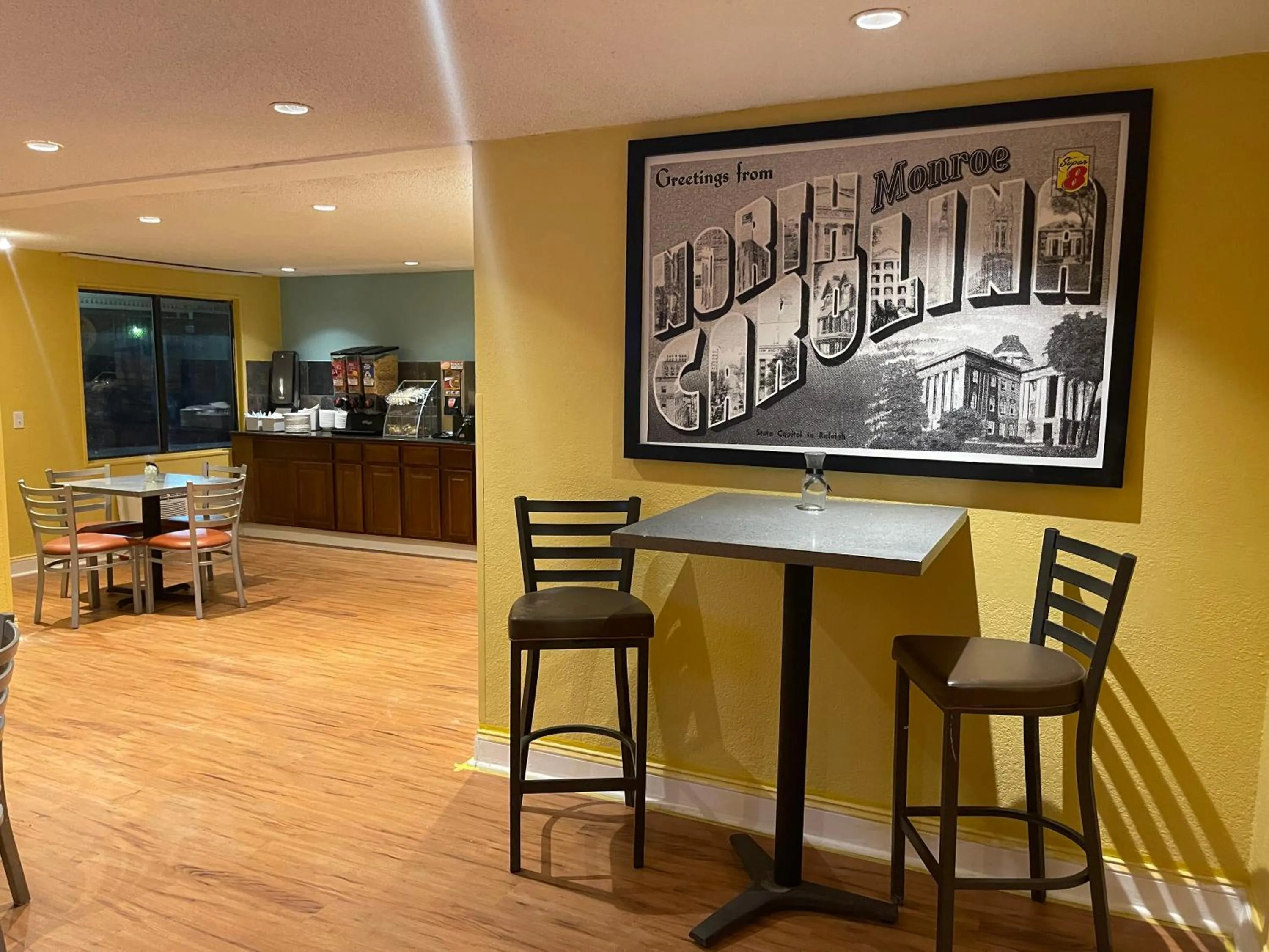 Seating area in Super 8 by Wyndham Monroe