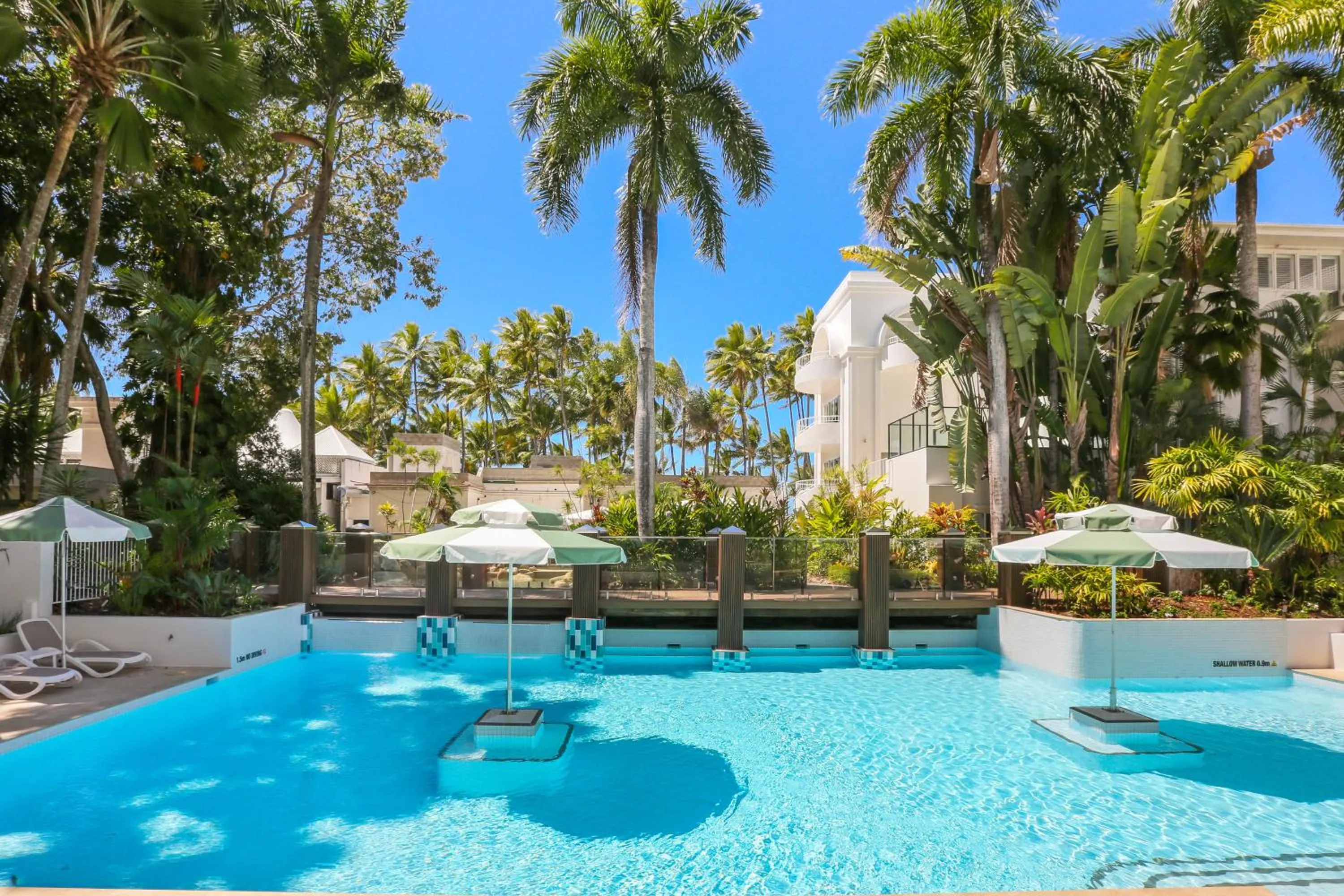 Pool view in Alamanda Palm Cove by Lancemore