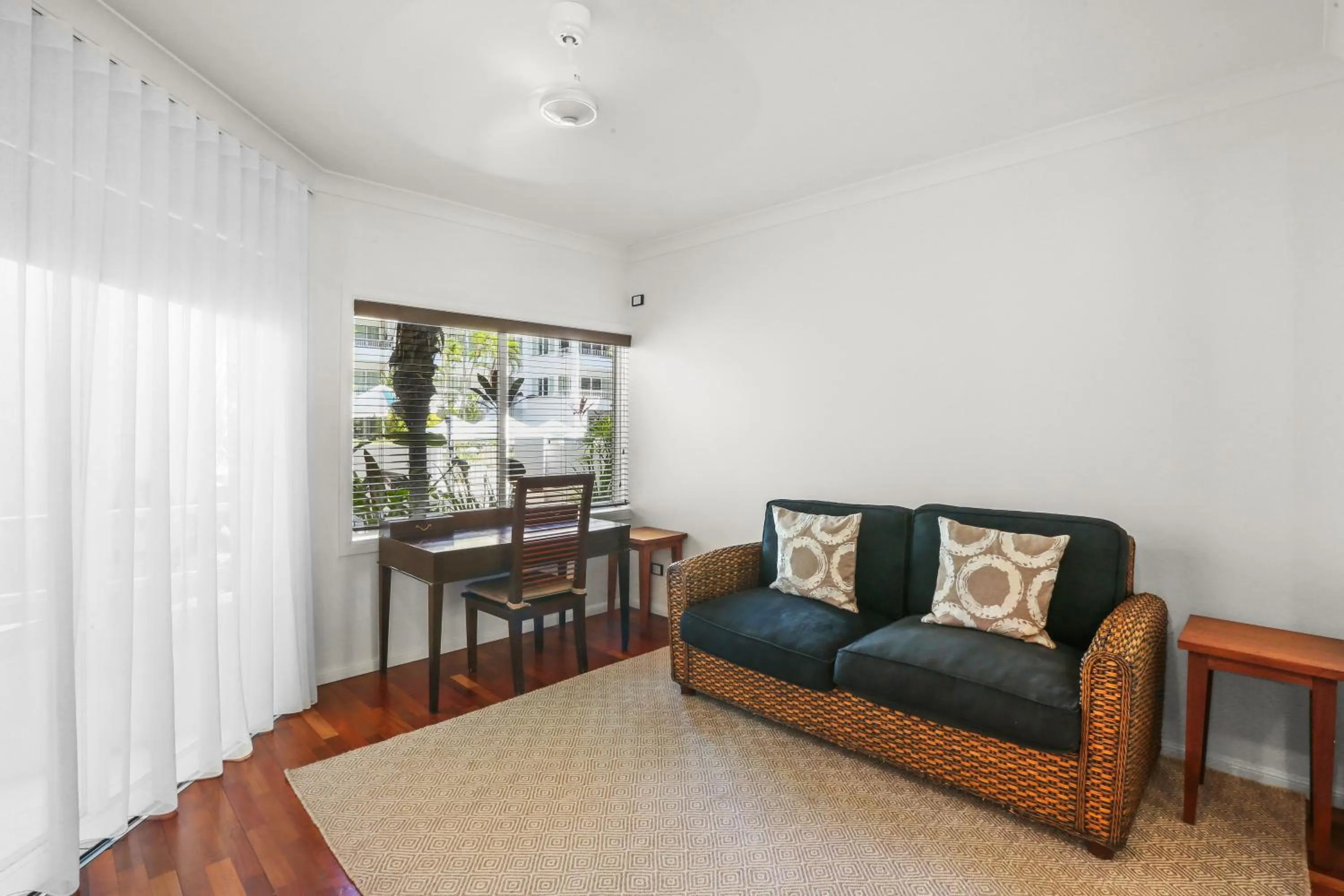 Seating area in Alamanda Palm Cove by Lancemore