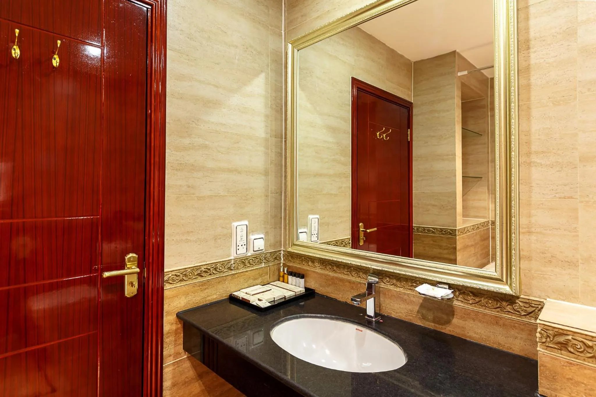 Bathroom in Renion Residence Hotel