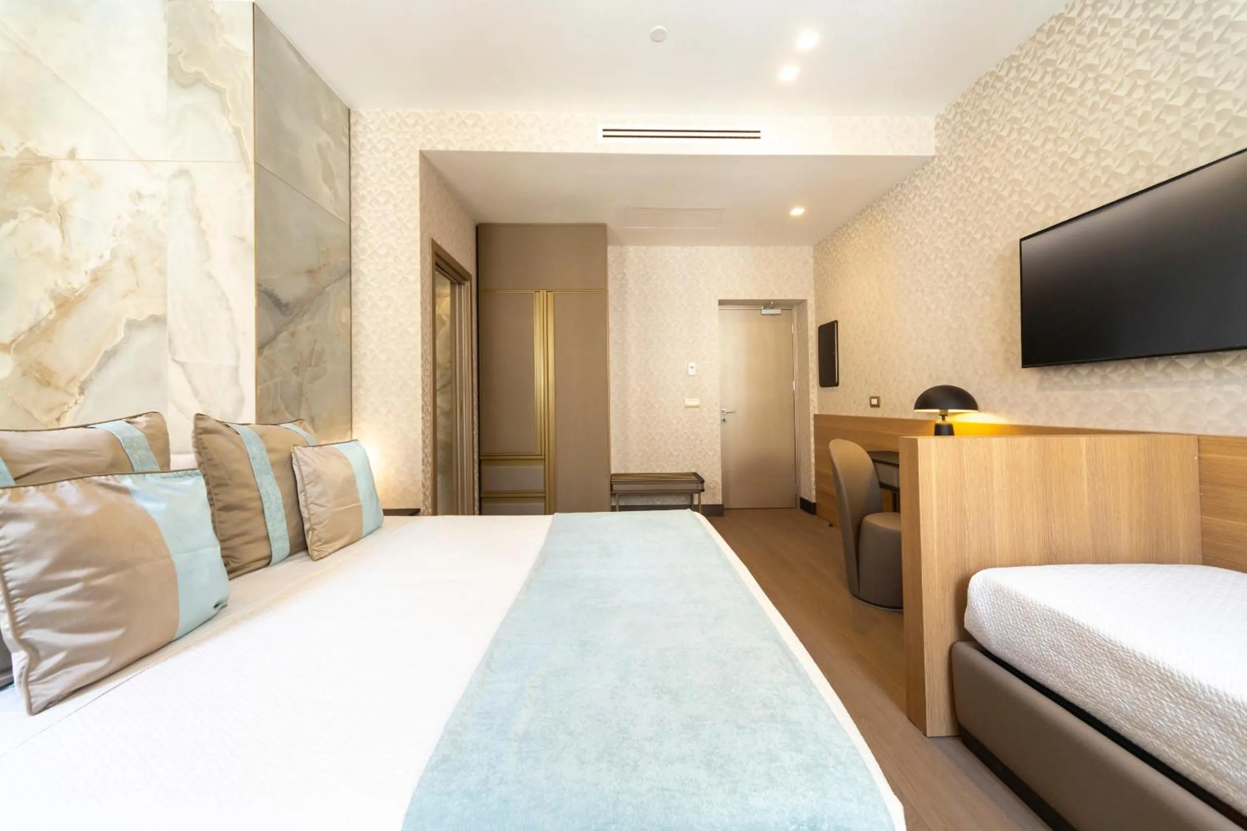 Bed in San Carlo Suite