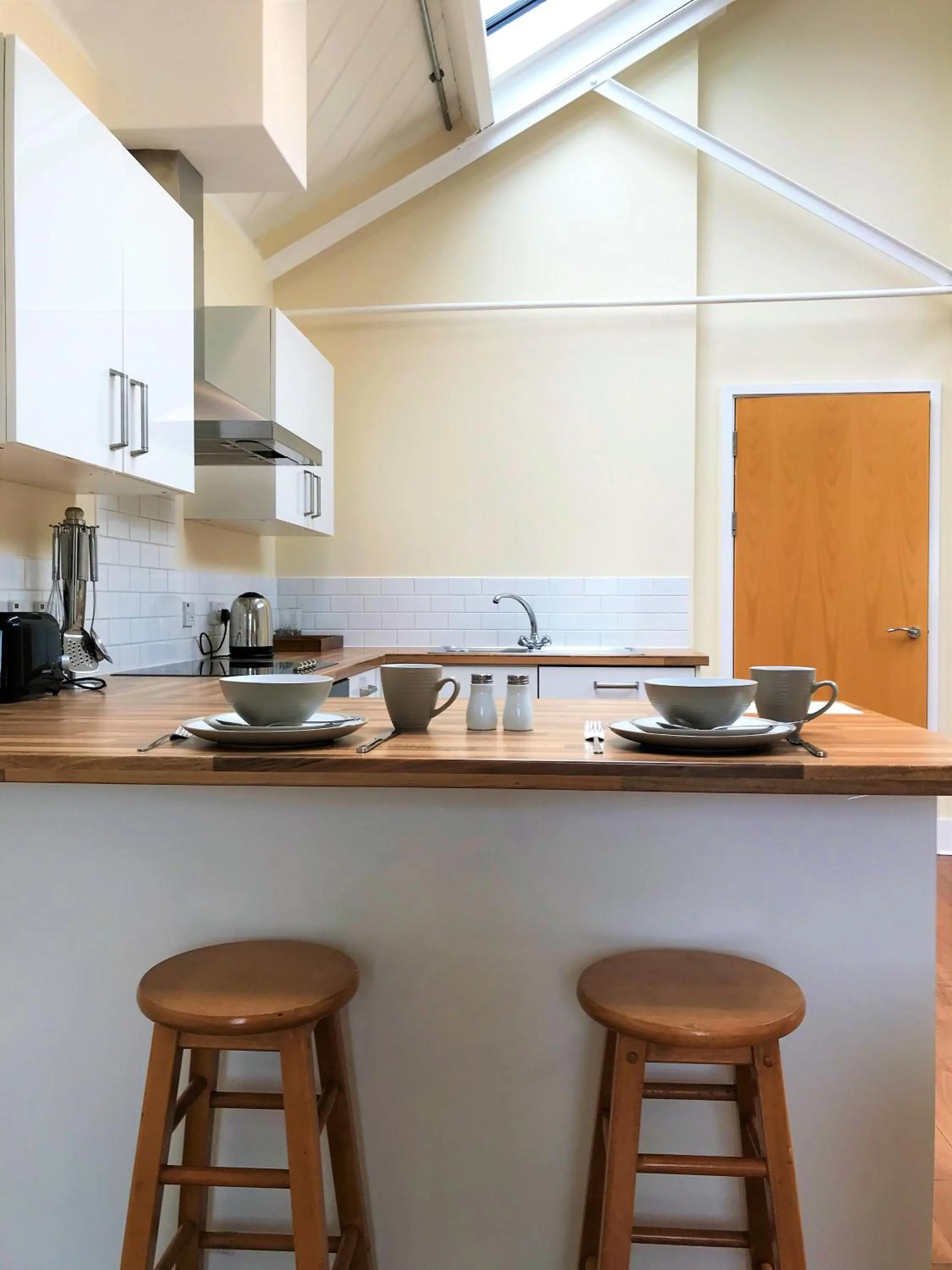 Kitchen or kitchenette in Ice House Apartments