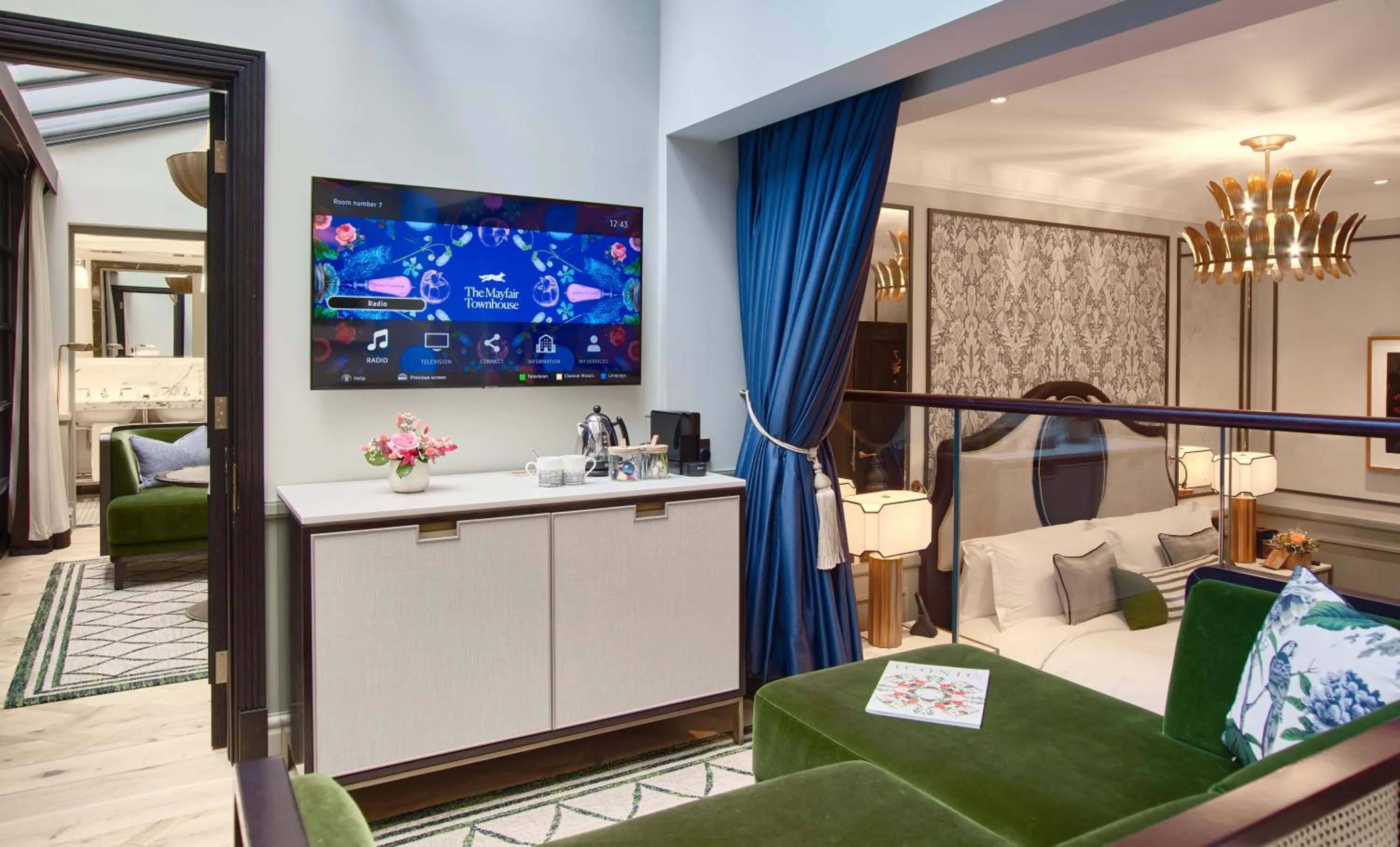 Communal lounge/ TV room in The Mayfair Townhouse - an Iconic Luxury Hotel