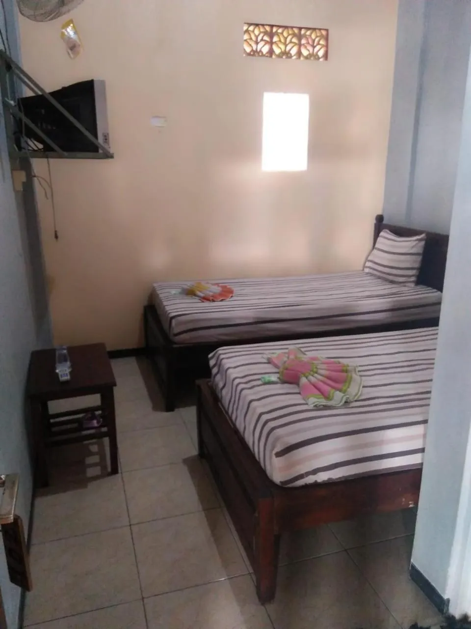 Bed in Penginapan Hotel Mangir Asri