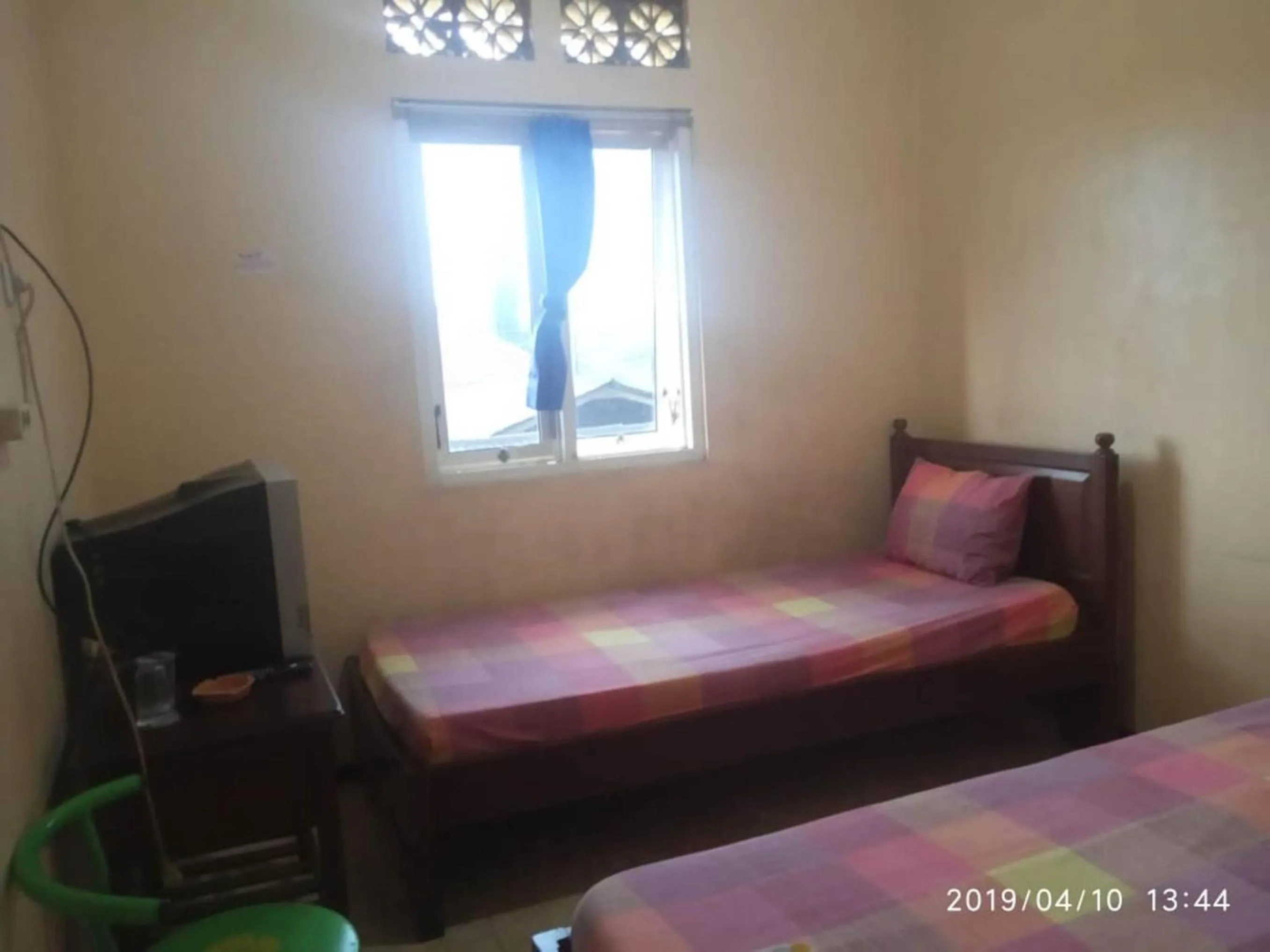 Bed in Penginapan Hotel Mangir Asri