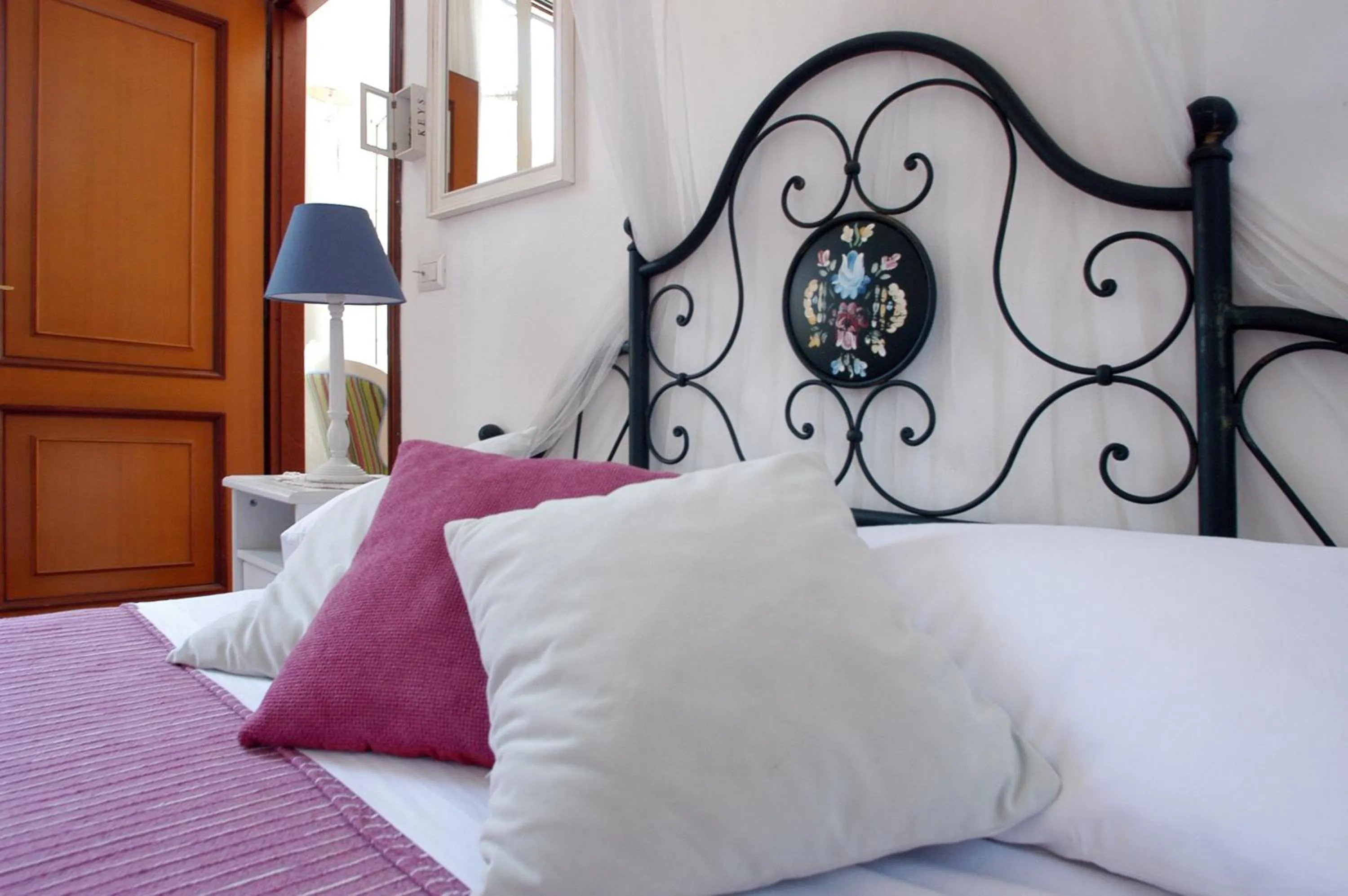 Decorative detail, Bed in Barocchetto Romano