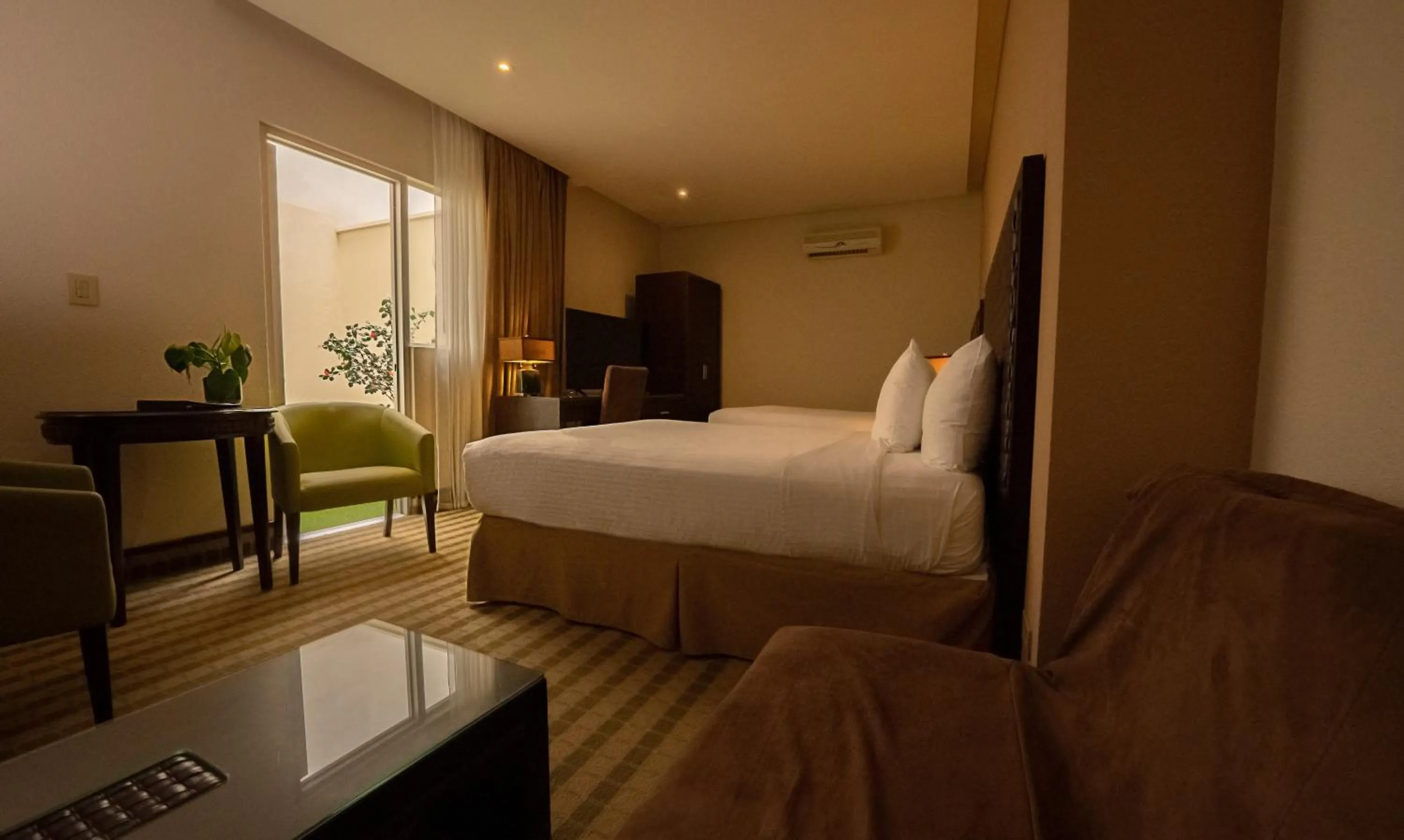 Photo of the whole room, Bed in Rincon del Valle Hotel & Suites