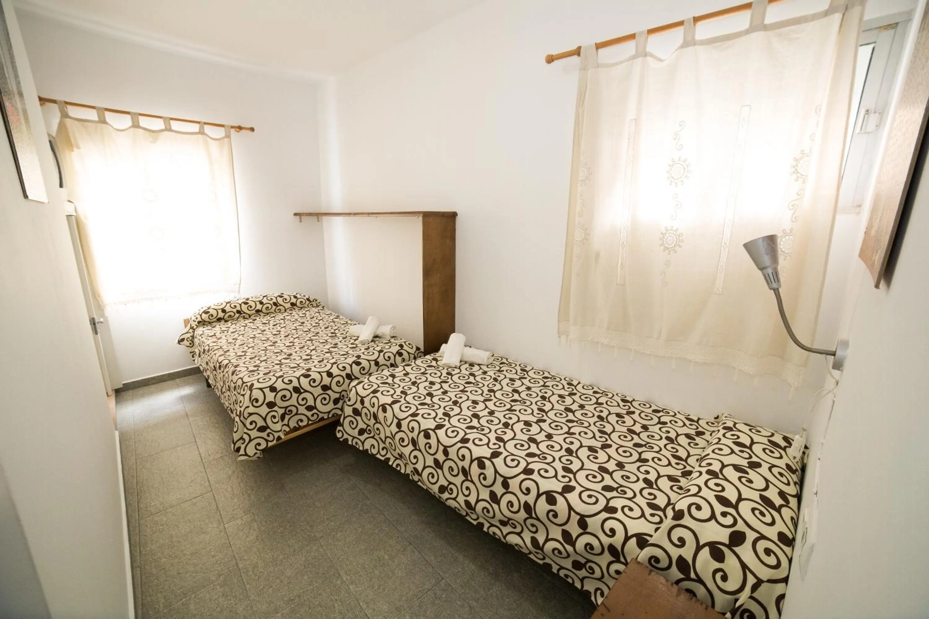 Decorative detail, Bed in Hospedaje Lisboa Algeciras P Ca 0214 y A Ca 0232