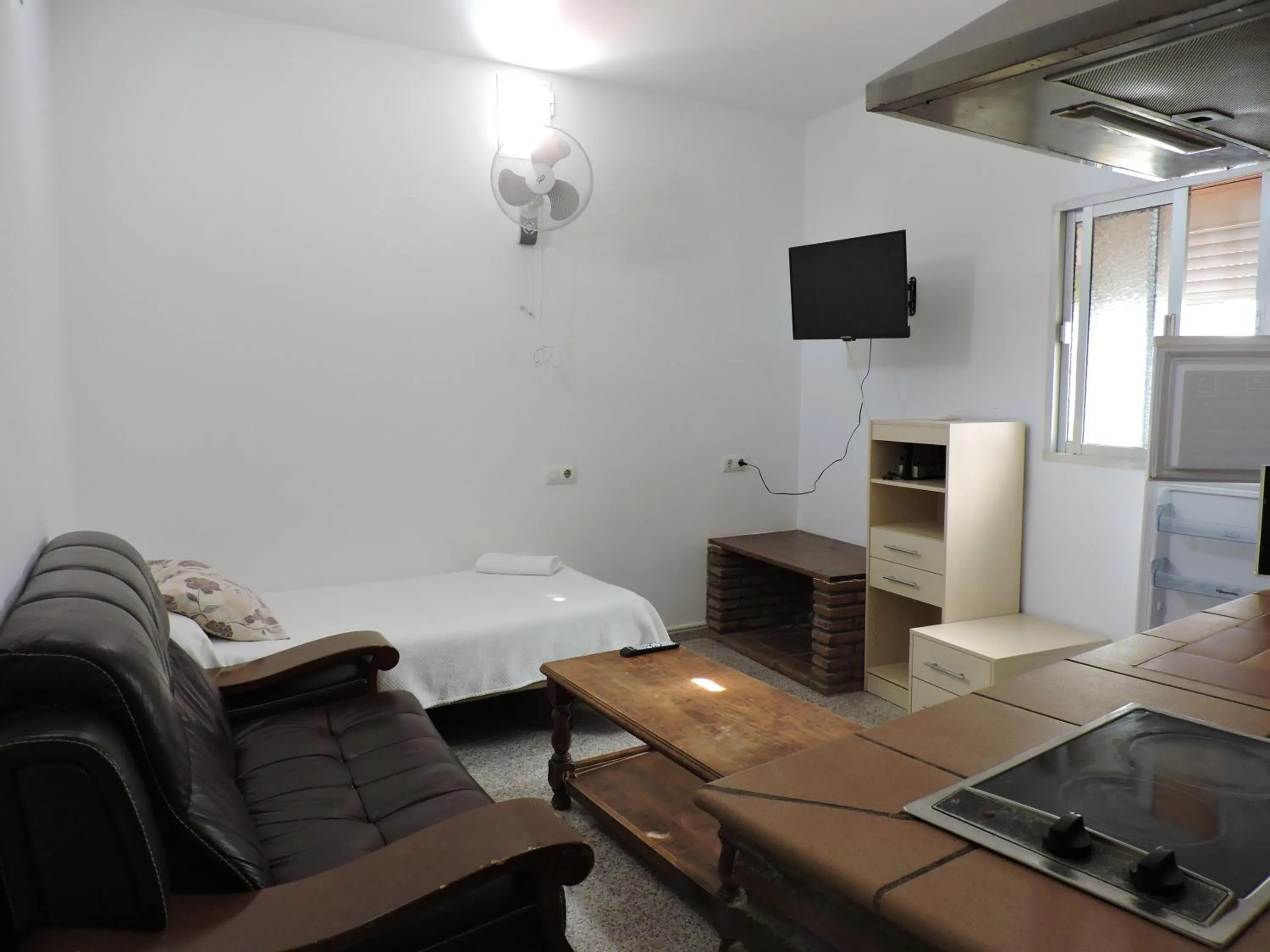 Communal lounge/ TV room, Bed in Hospedaje Lisboa Algeciras P Ca 0214 y A Ca 0232