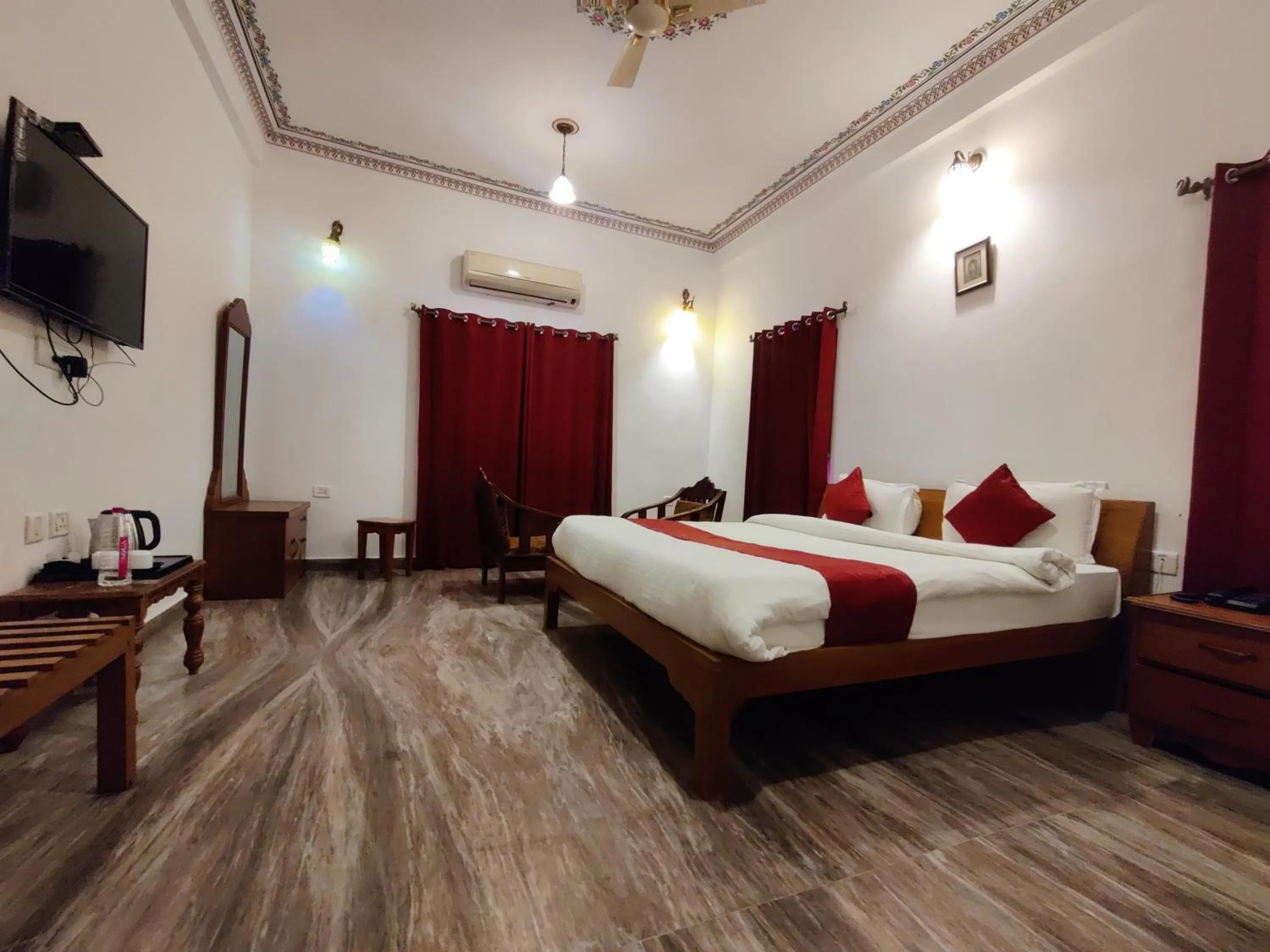 Bed in Satyam Palace Resort