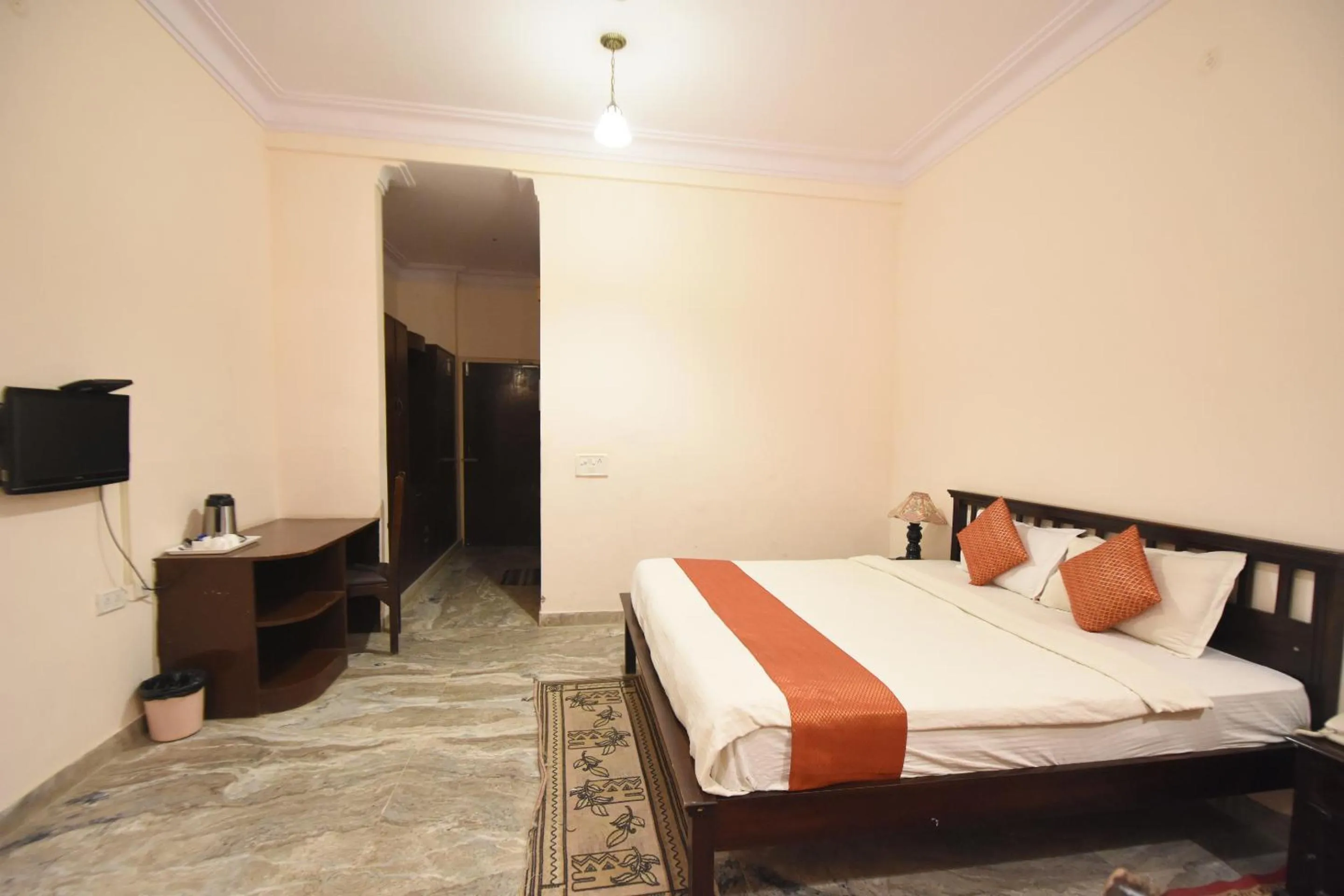 Bed in Satyam Palace Resort