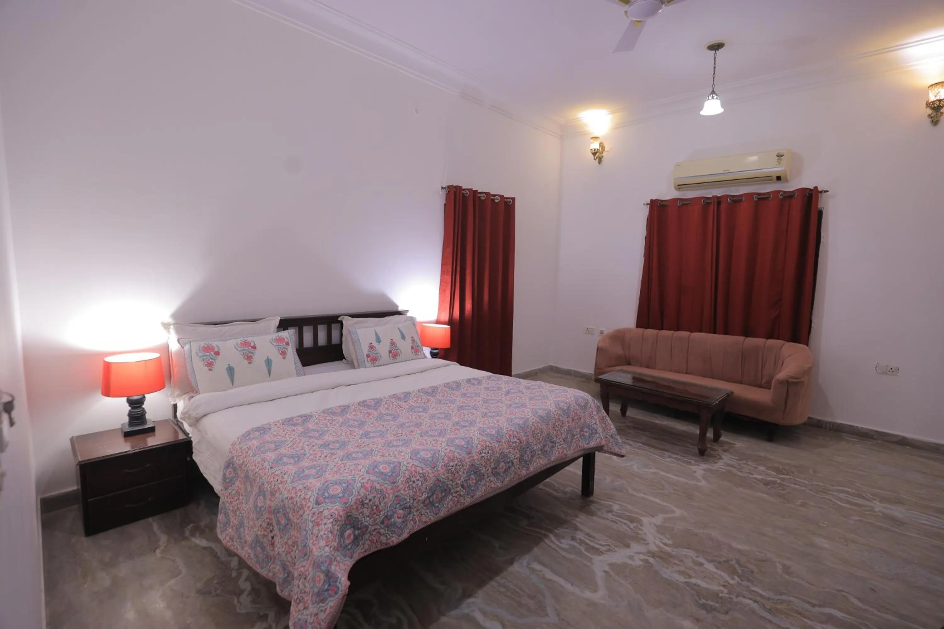 Bed in Satyam Palace Resort