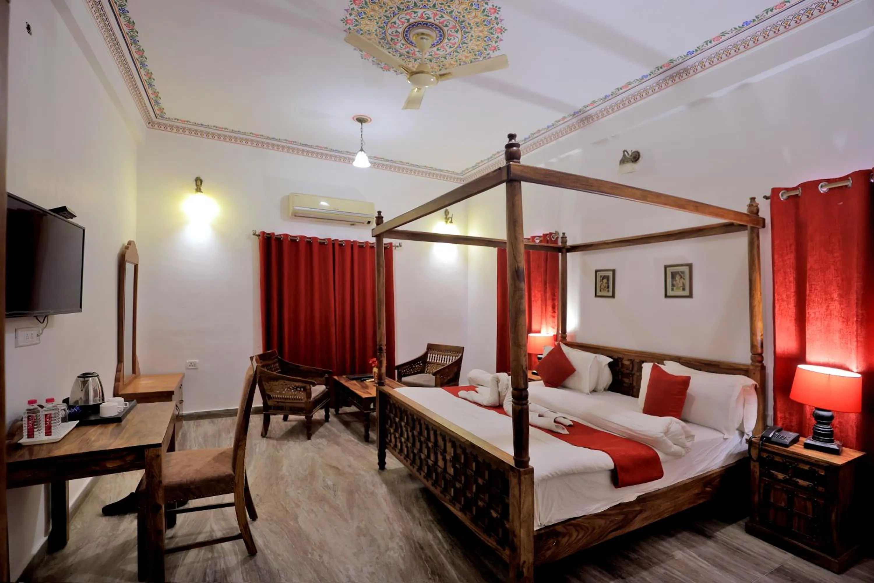 Bed in Satyam Palace Resort