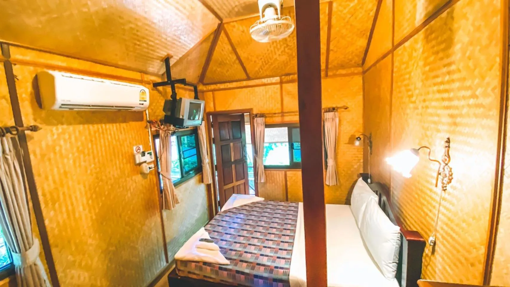 TV and multimedia, Bed in Faasai Resort & Spa