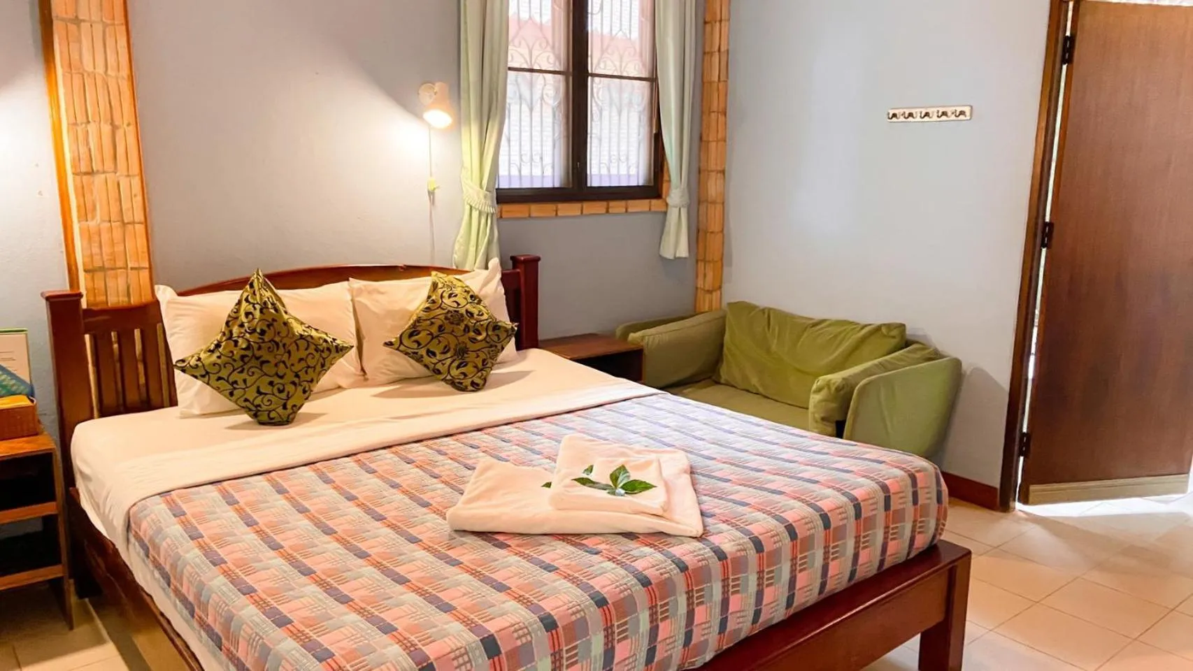 Bed in Faasai Resort & Spa