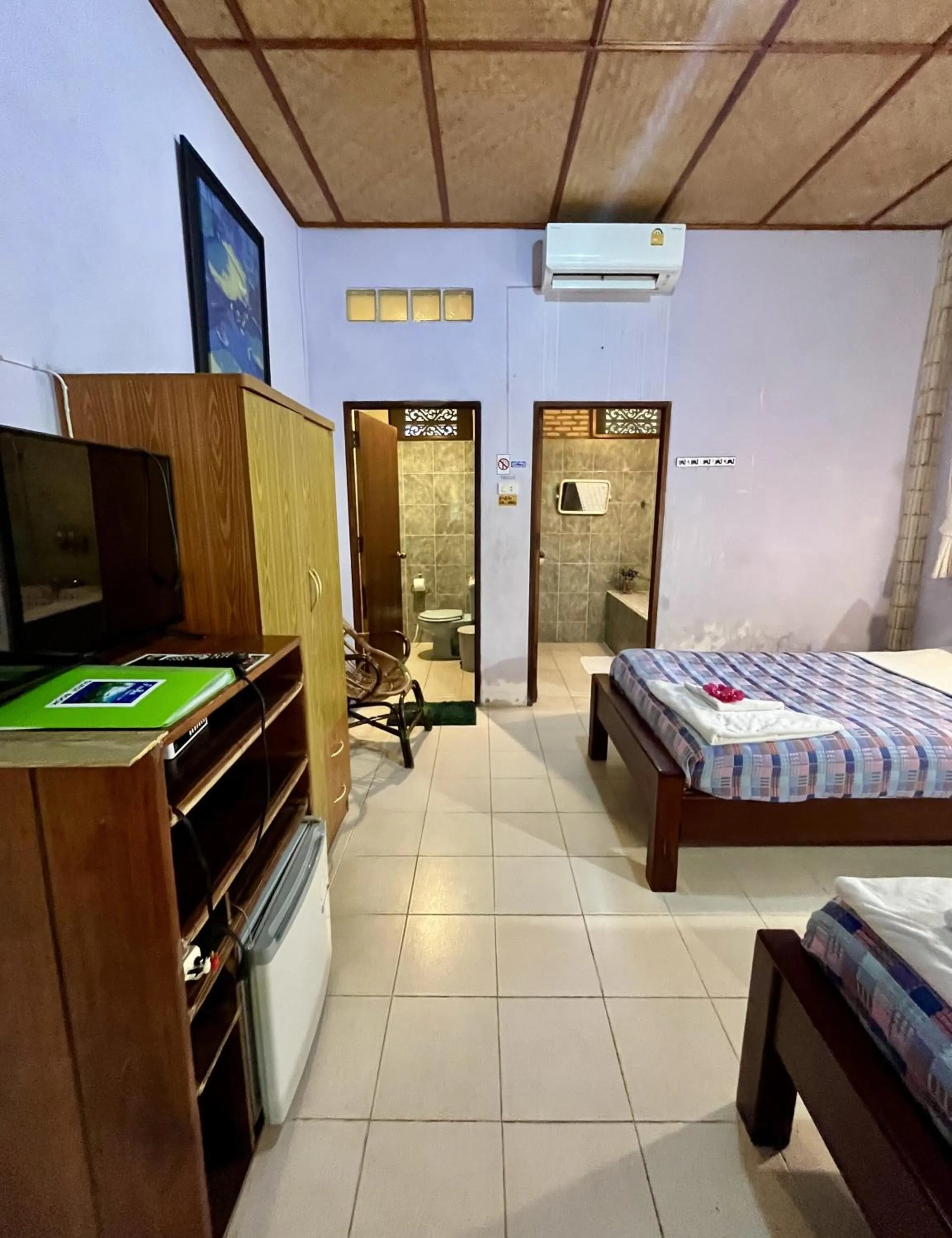 Bed in Faasai Resort & Spa