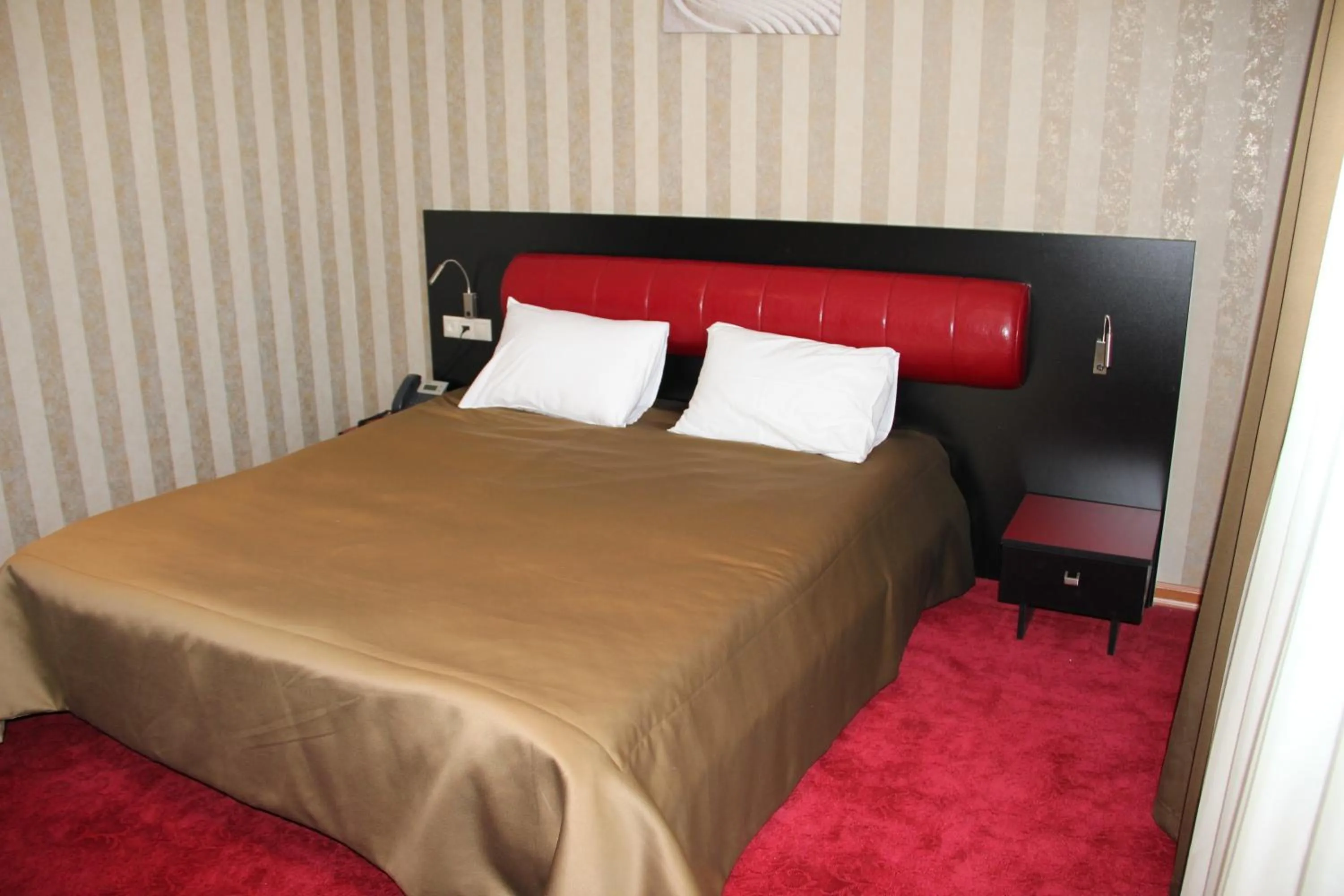 Bed in Hotel Villa Palace