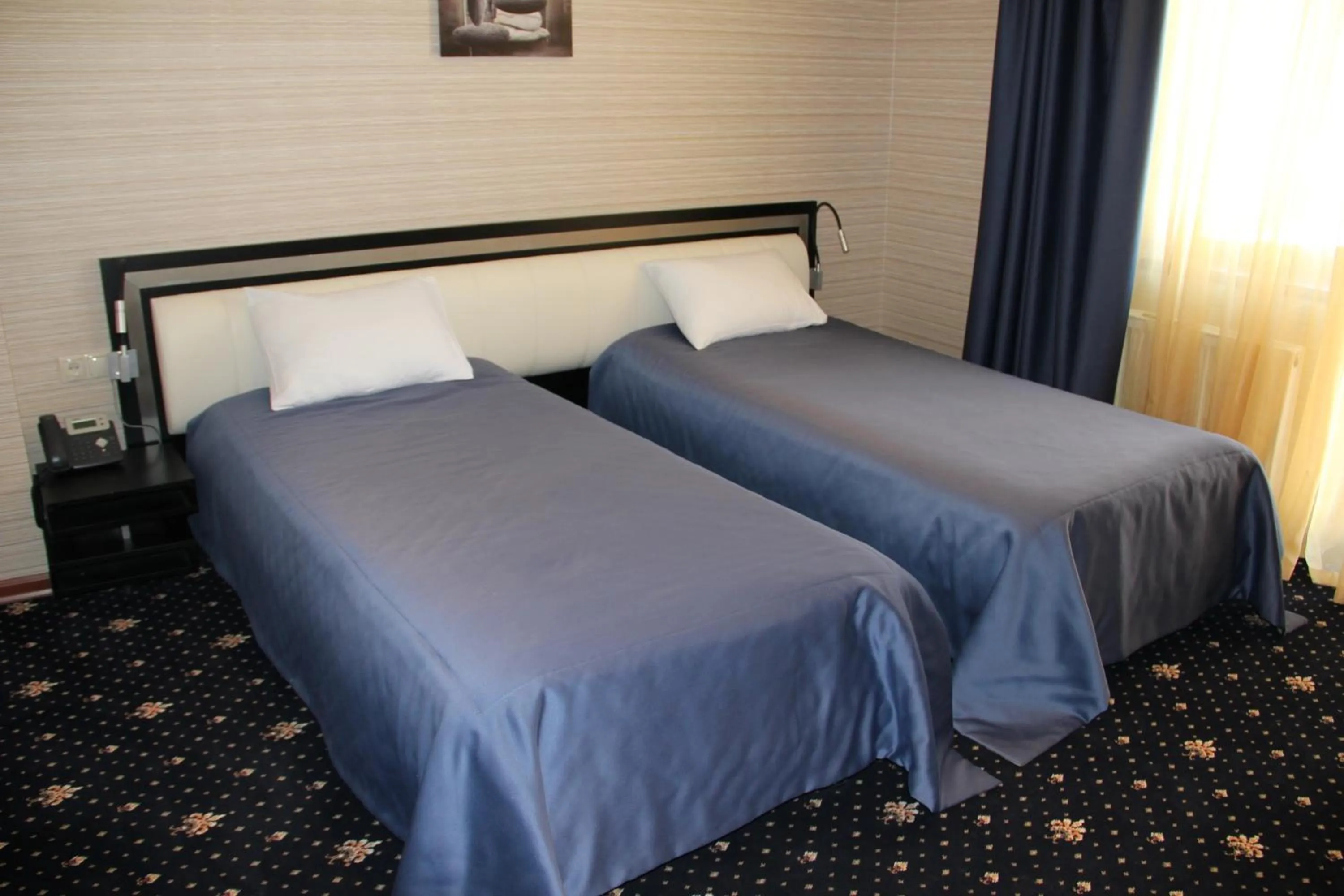 Bed in Hotel Villa Palace