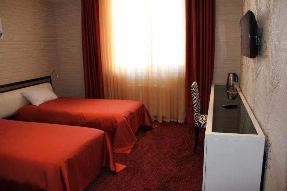 Bed in Hotel Villa Palace