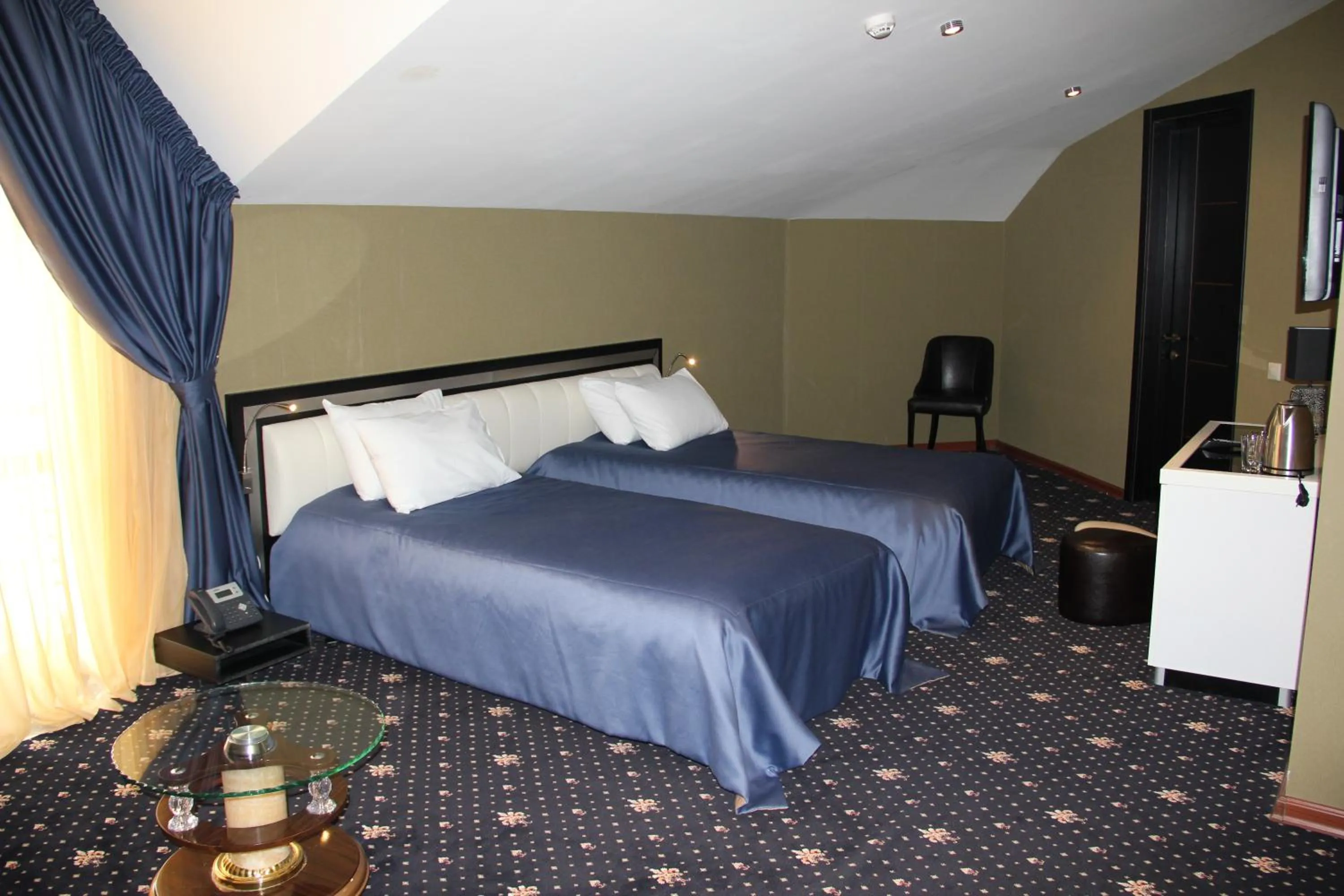 Bed in Hotel Villa Palace