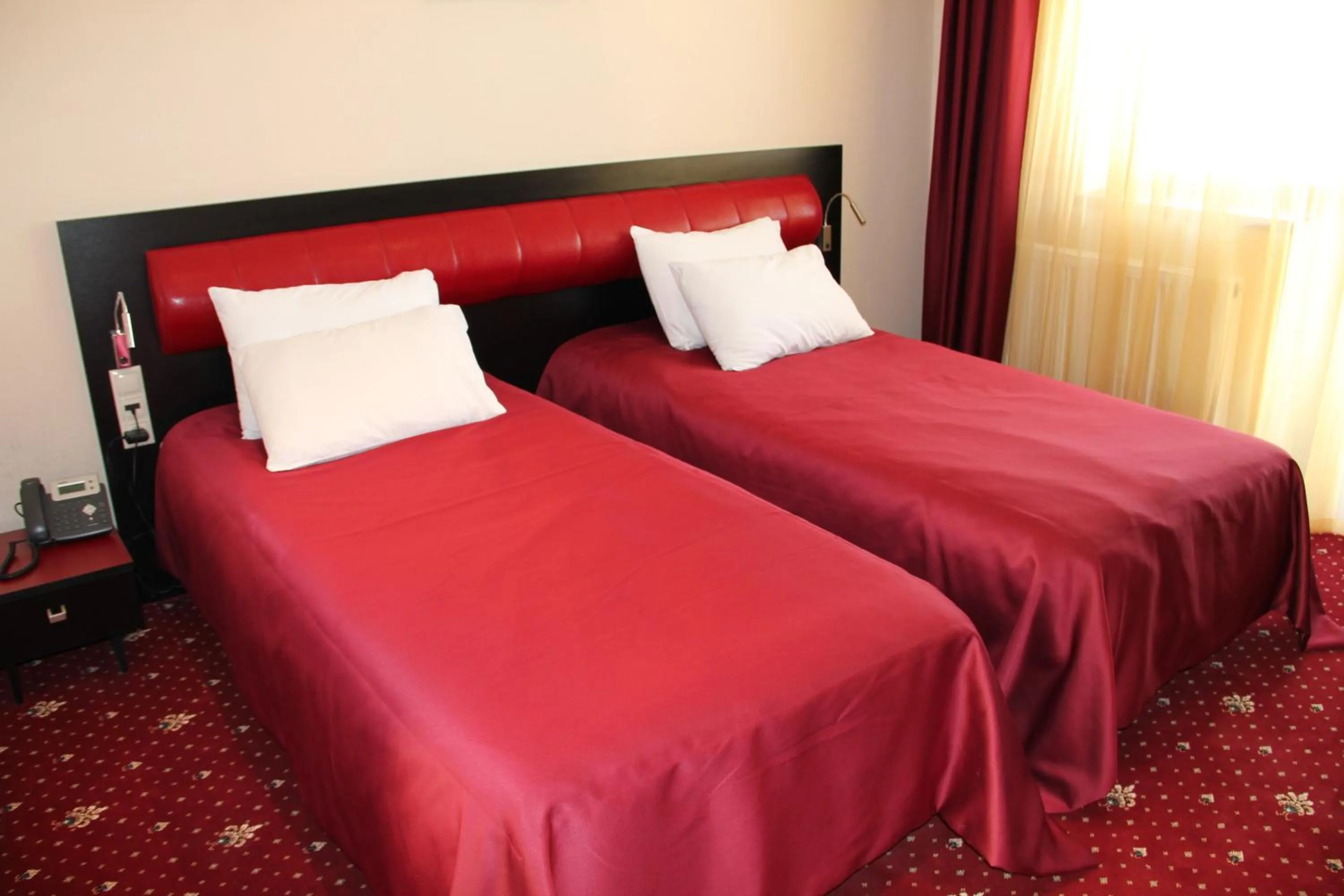 Bed in Hotel Villa Palace