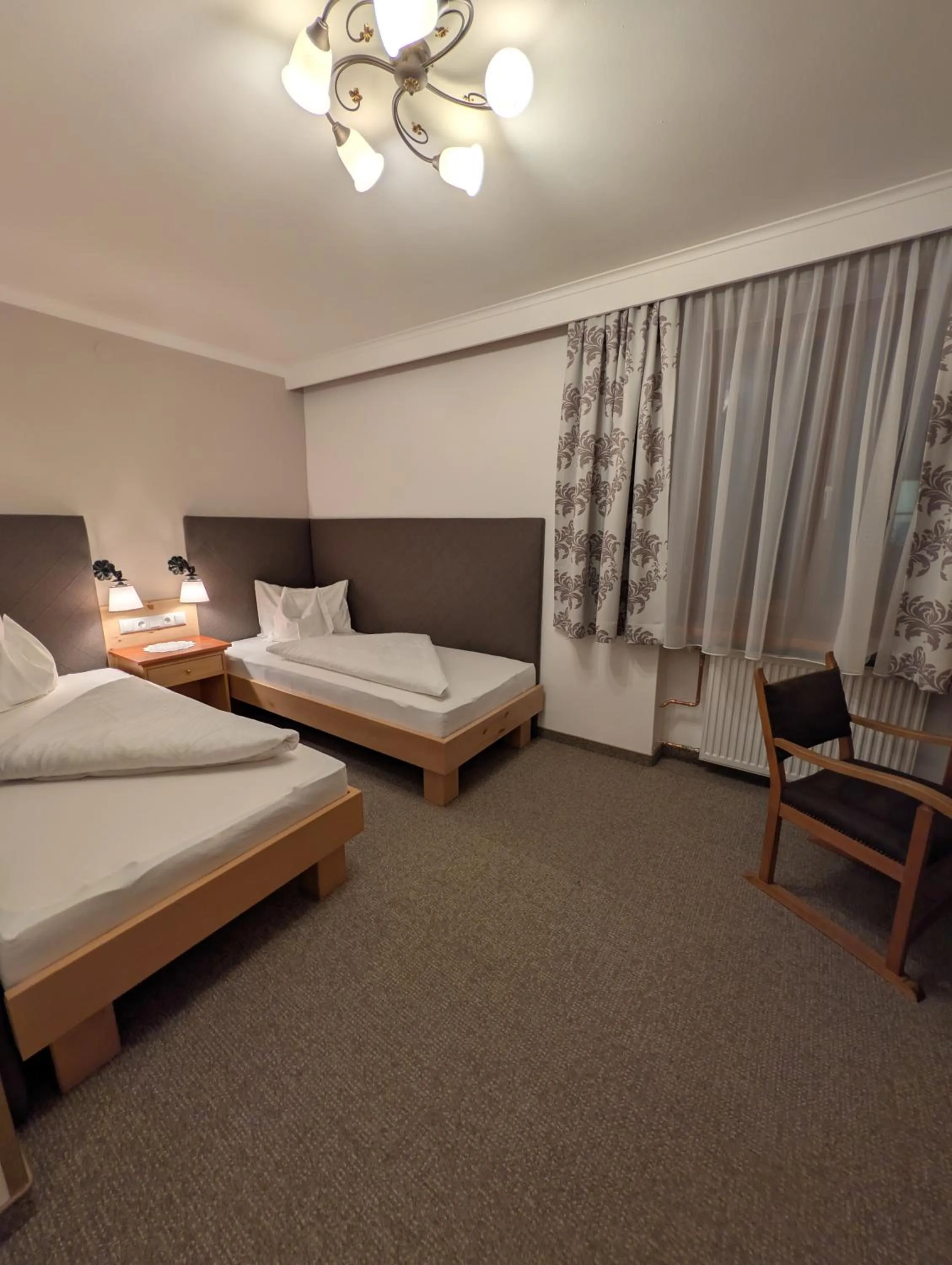 Photo of the whole room, Bed in Hotel Krimmlerfälle