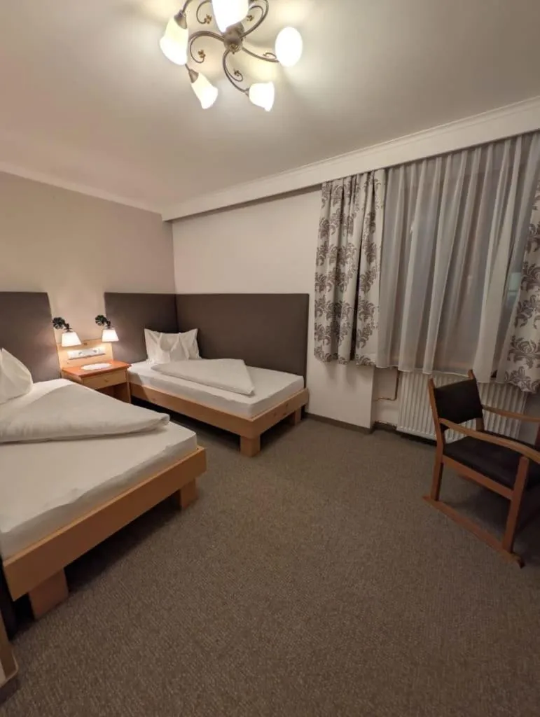 Photo of the whole room, Bed in Hotel Krimmlerfälle