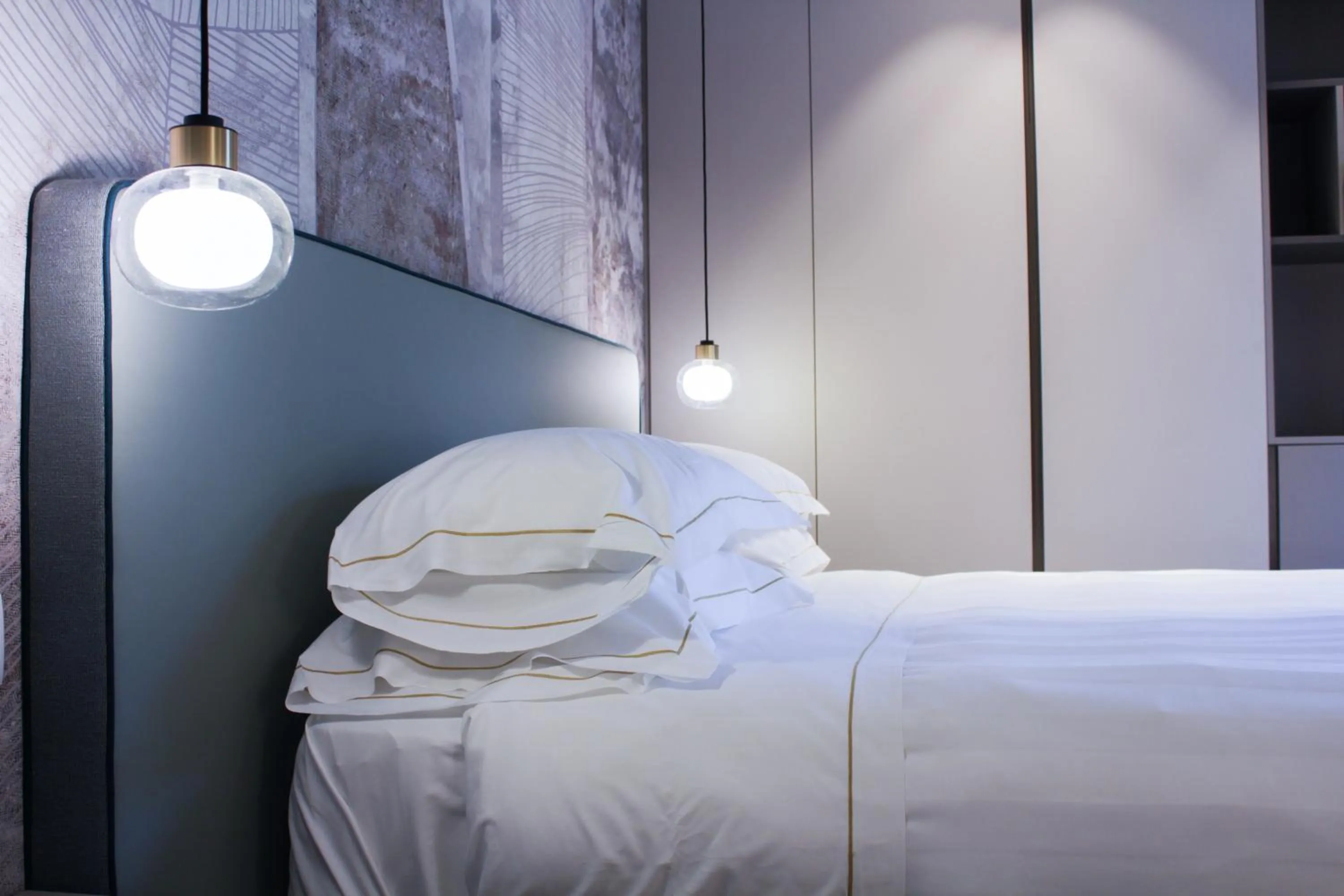 Bed in Diana Grand Hotel