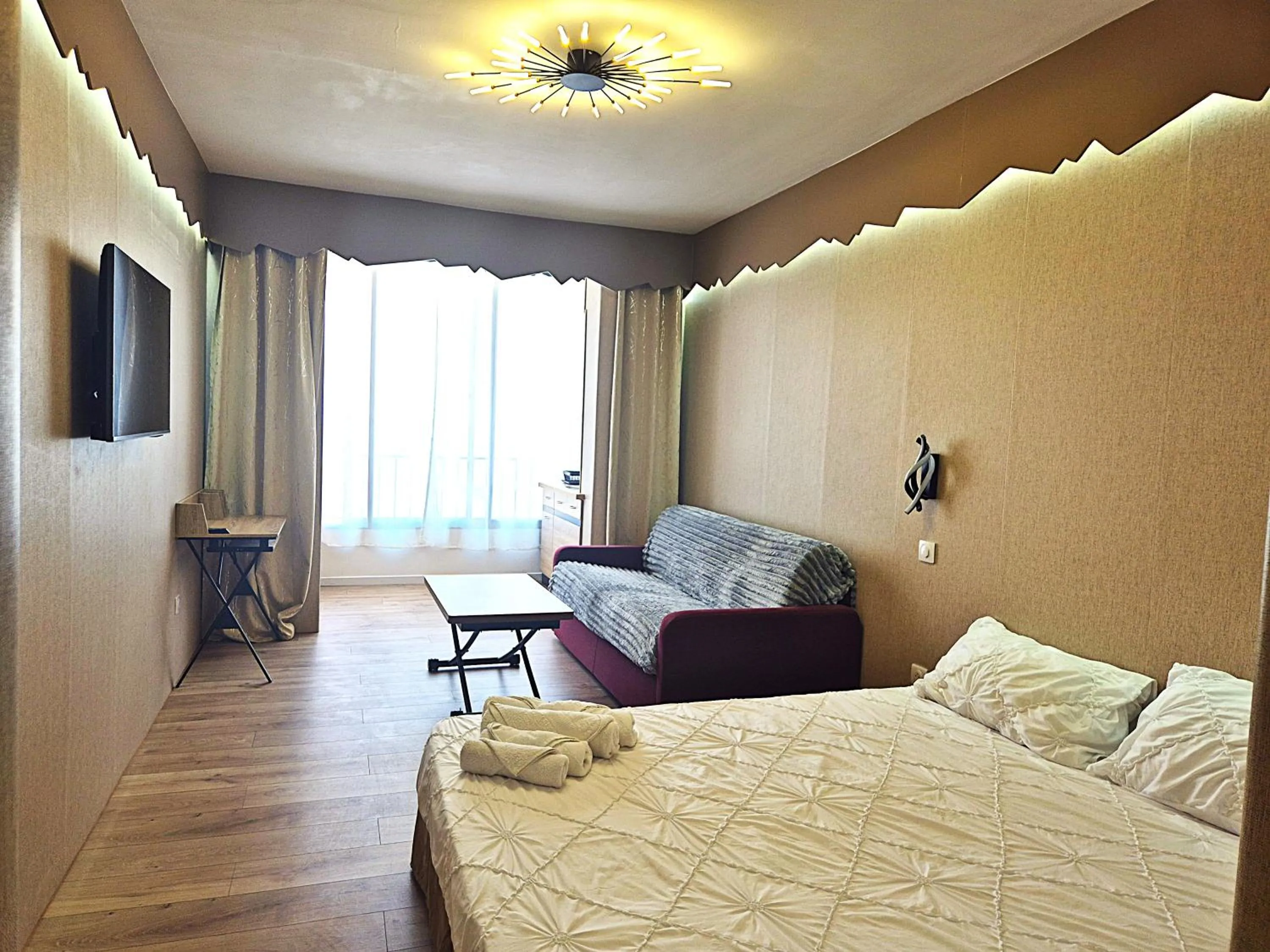 Bed in Hôtel le Colibri