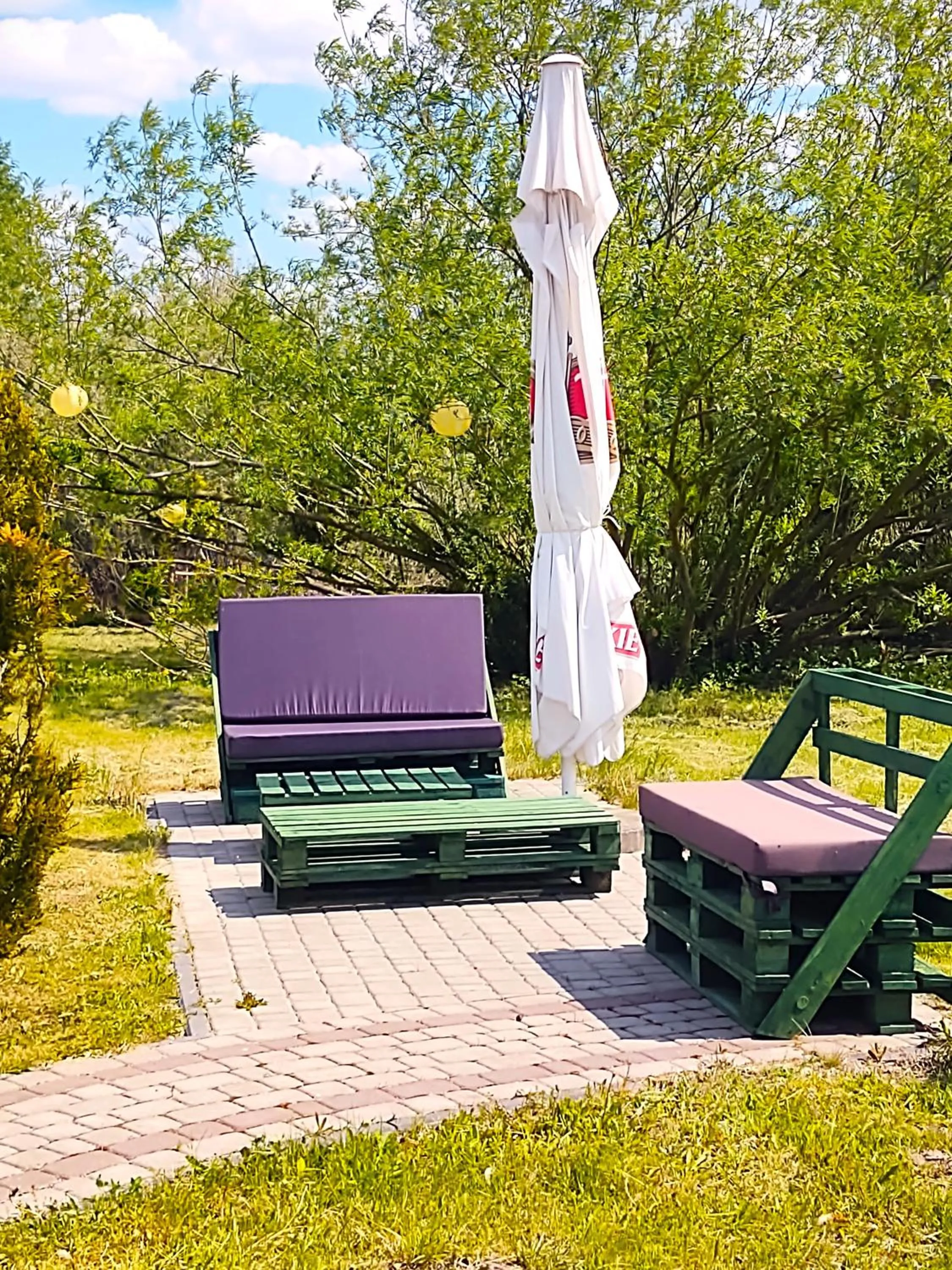 Garden in Mazurska Chata jezioro i aquapark 6 min, centrum i promenada 12 min