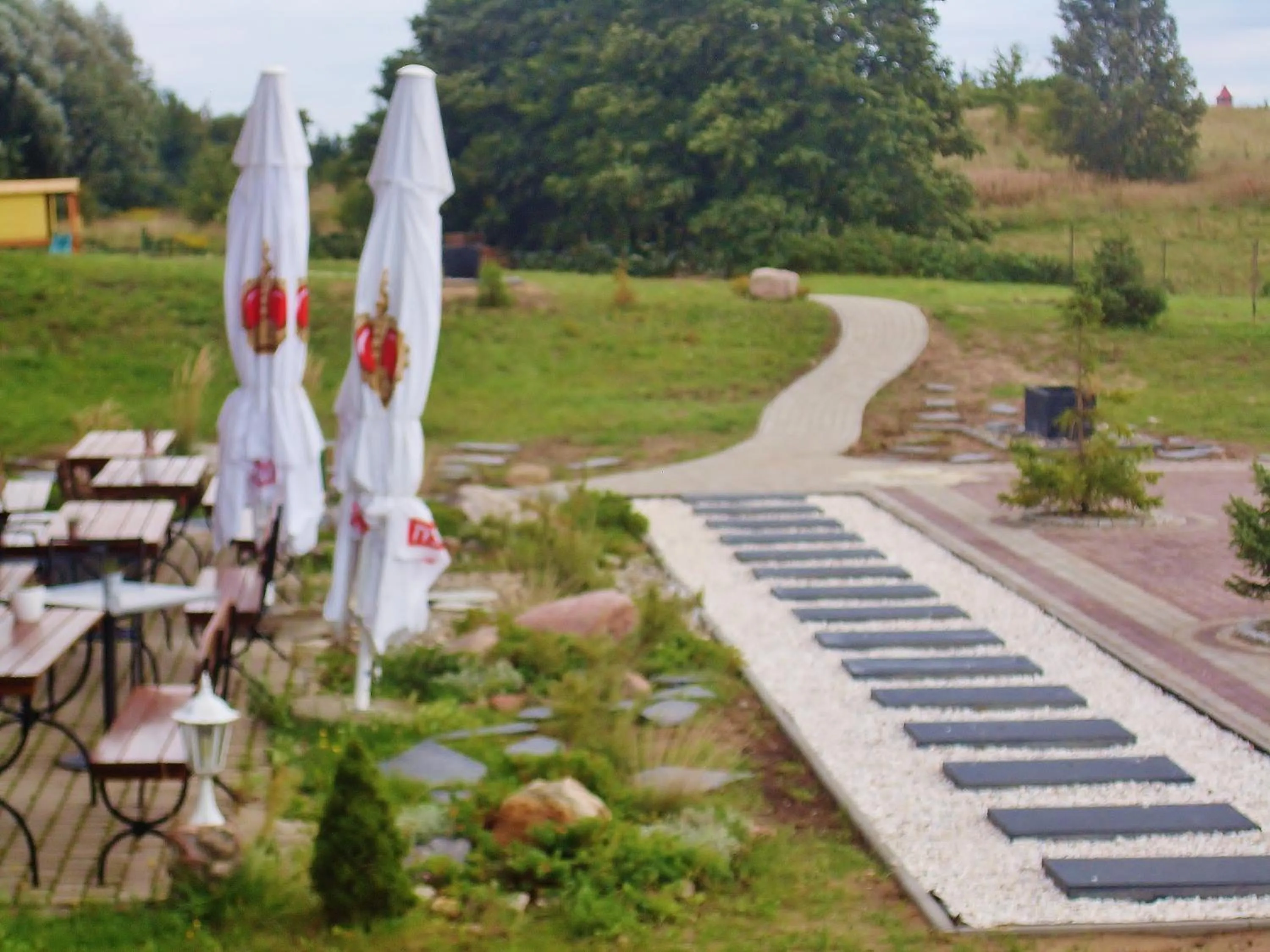 Garden in Mazurska Chata jezioro i aquapark 6 min, centrum i promenada 12 min