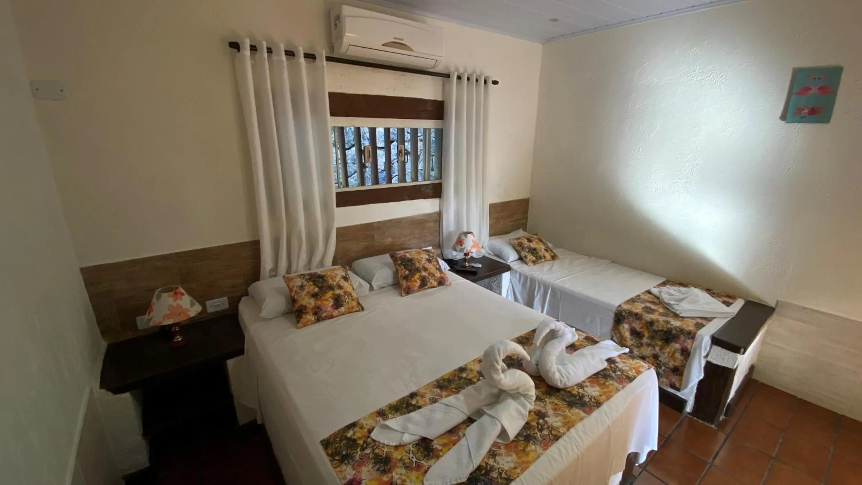 Bed in Pousada Aporan Ilhabela