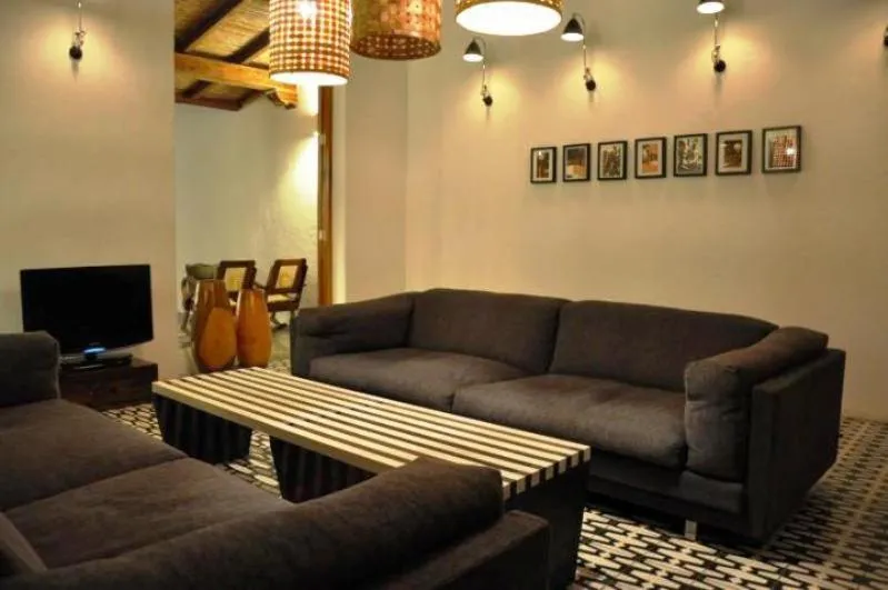 Communal lounge/ TV room in Los Patios Hotel Granada