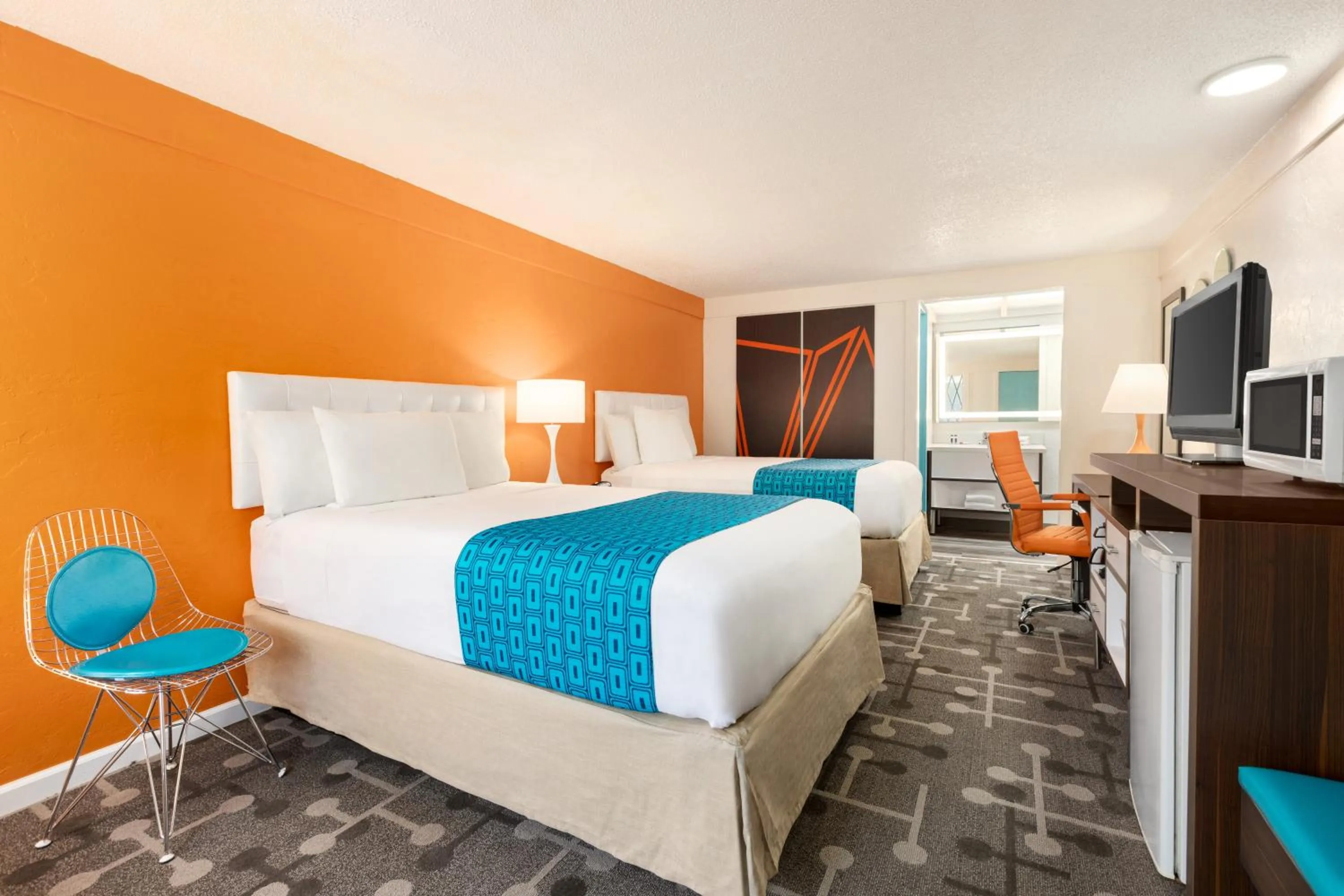 Bed in Dover Inn and Suites