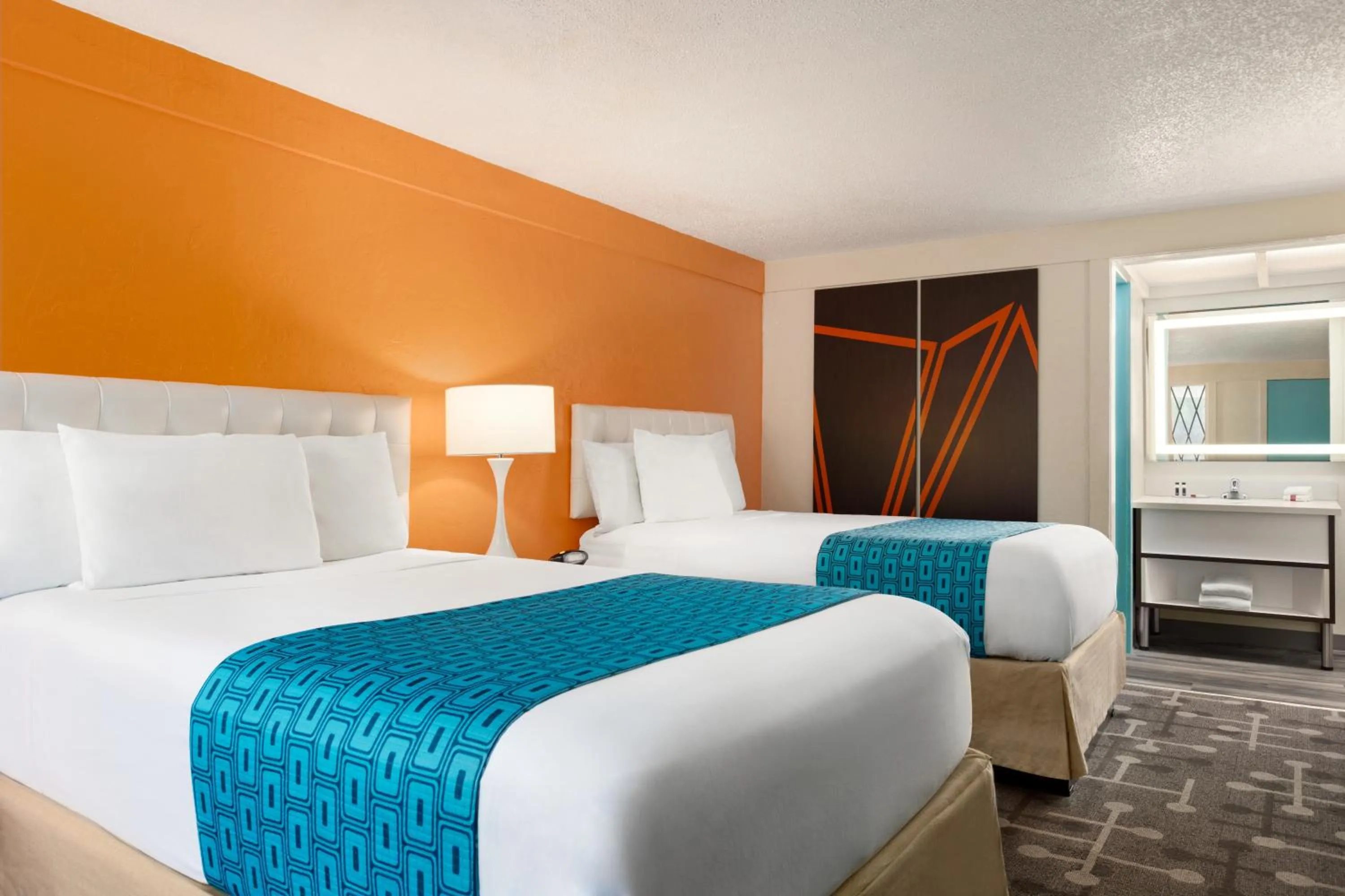 Bed in Dover Inn and Suites