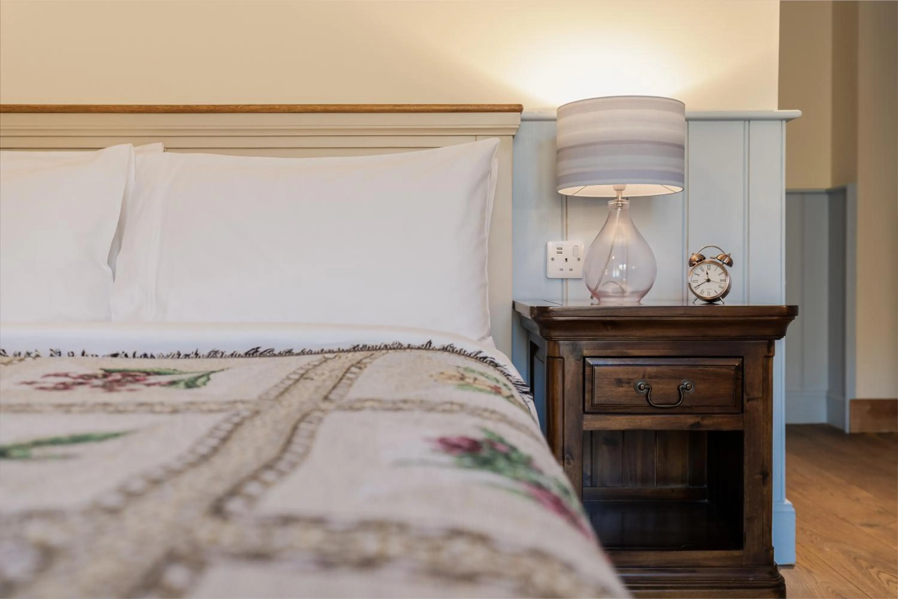 Bed in The Whispering Pine Lodge