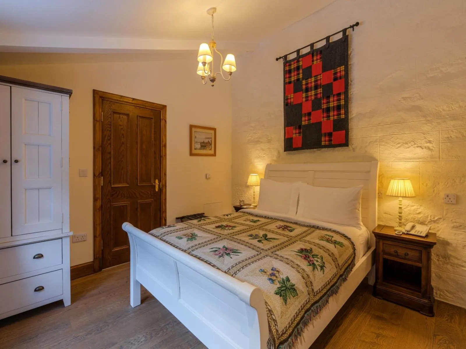 Bed in The Whispering Pine Lodge