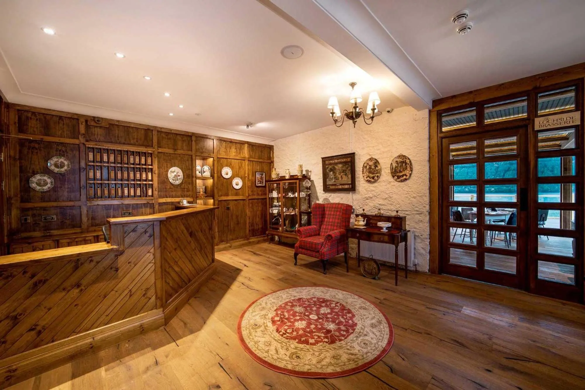 Lobby or reception in The Whispering Pine Lodge